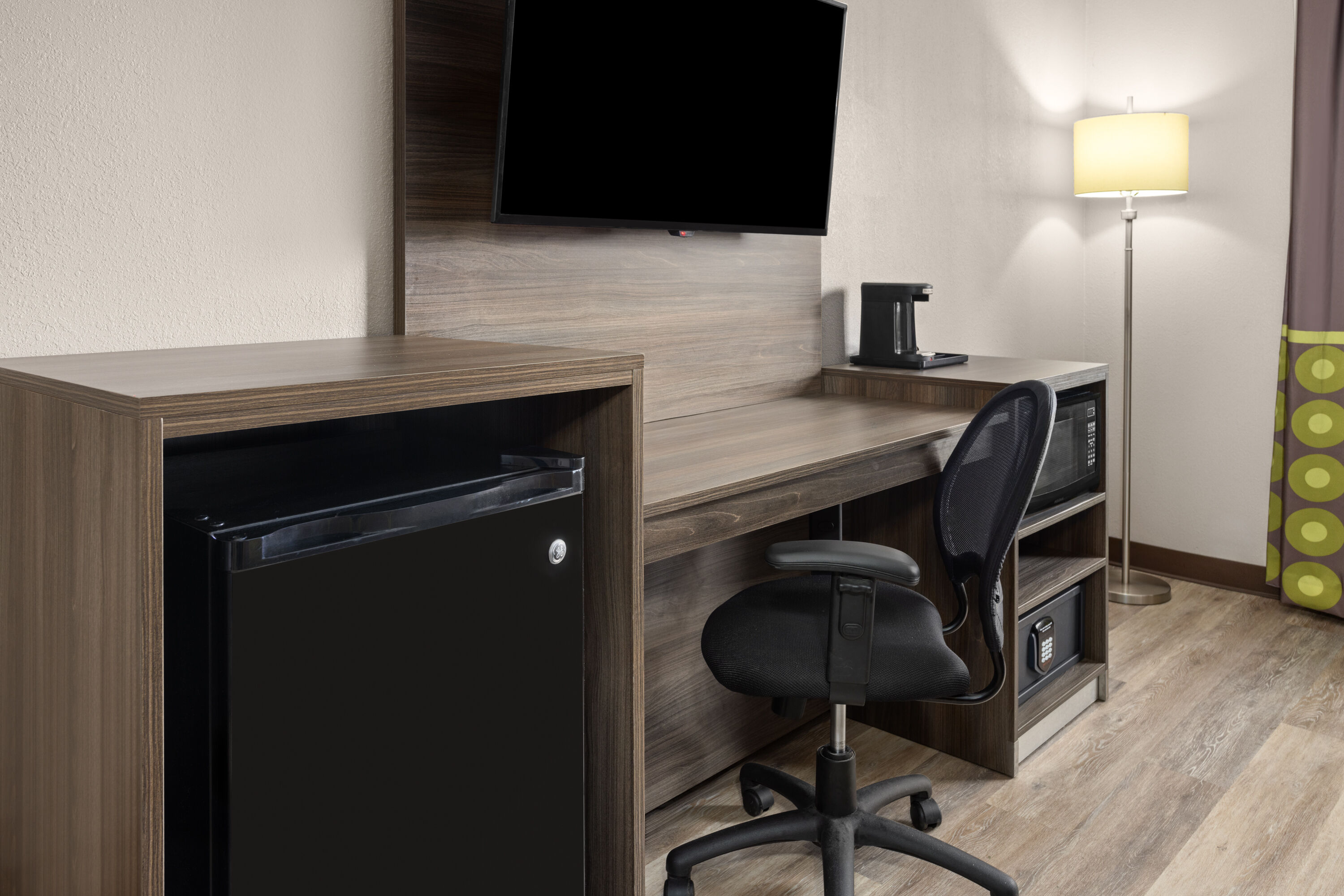 Guest room at the Super 8 by Wyndham Henrietta/Rochester Area in Henrietta, New York