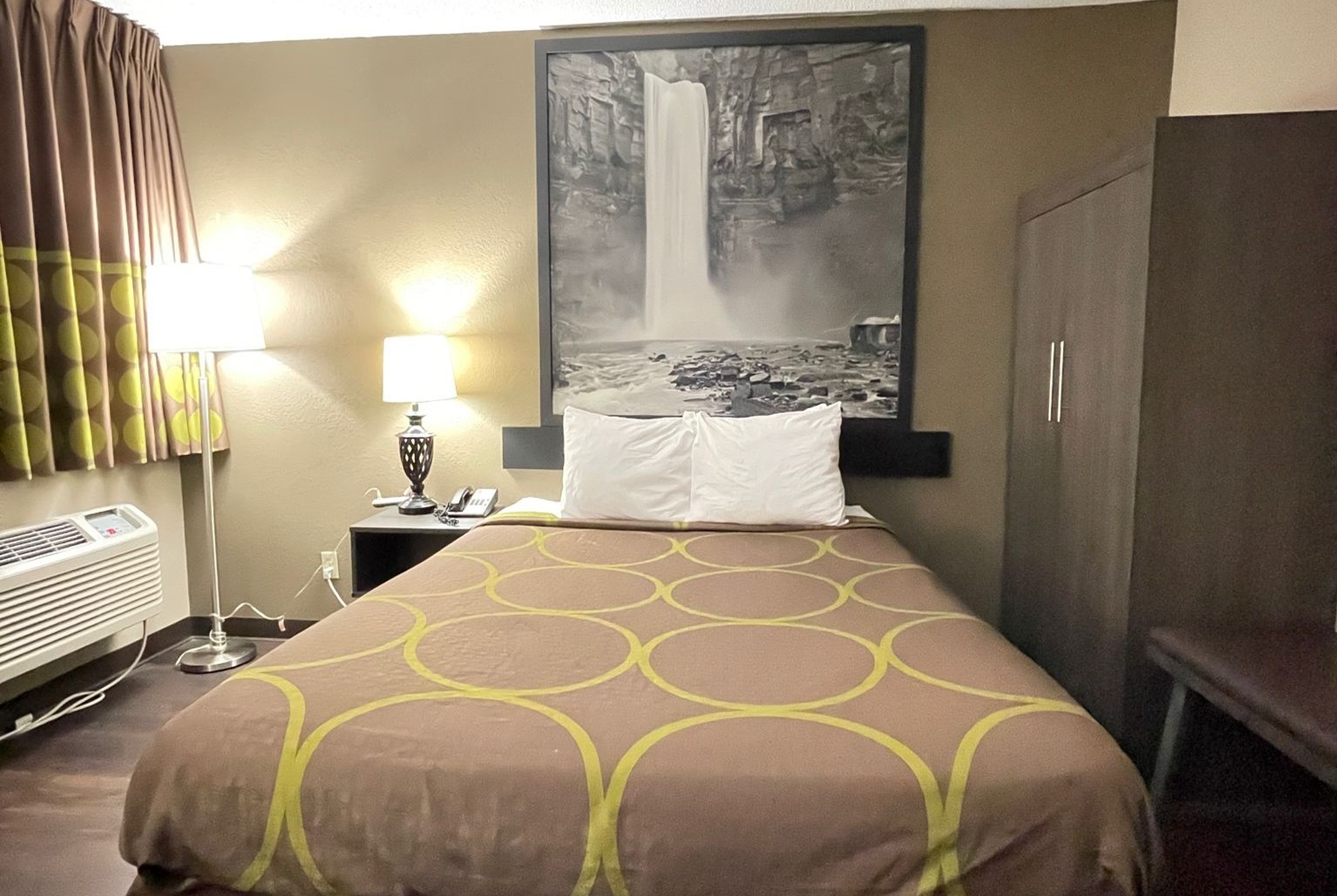 Guest room at the Super 8 by Wyndham Ithaca in Ithaca, New York