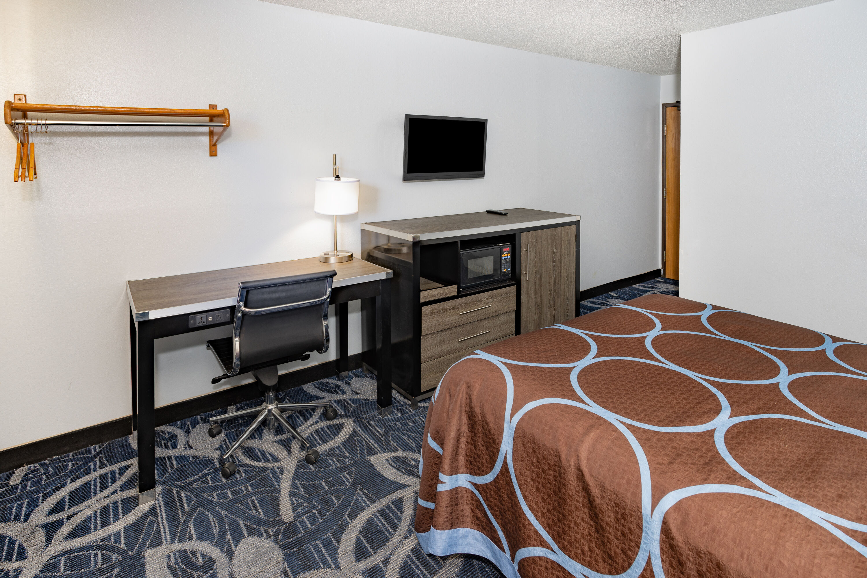 Guest room at the Super 8 by Wyndham Johnstown/Gloversville in Johnstown, New York