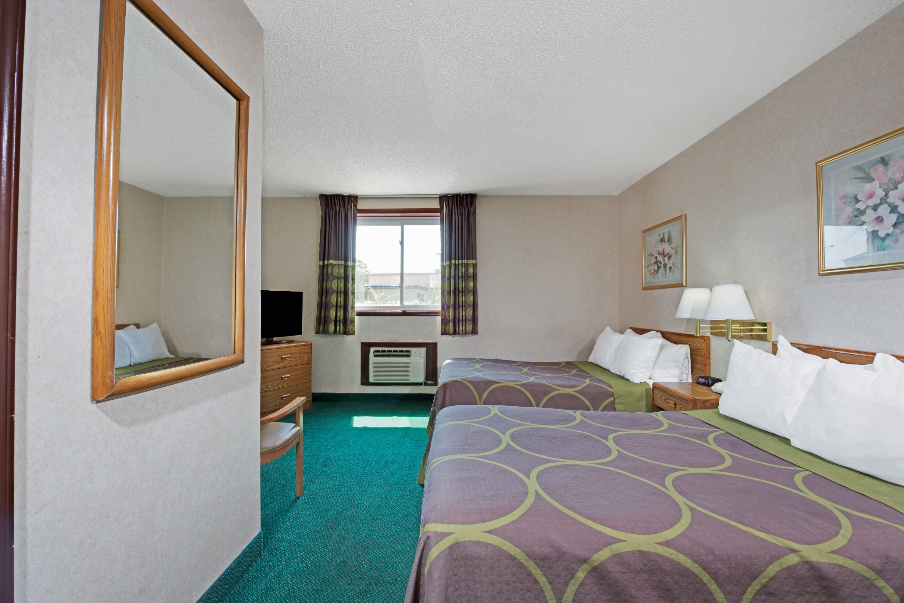 Guest room at the Super 8 by Wyndham Kenmore/Buffalo/Niagara Falls Area in Kenmore, New York
