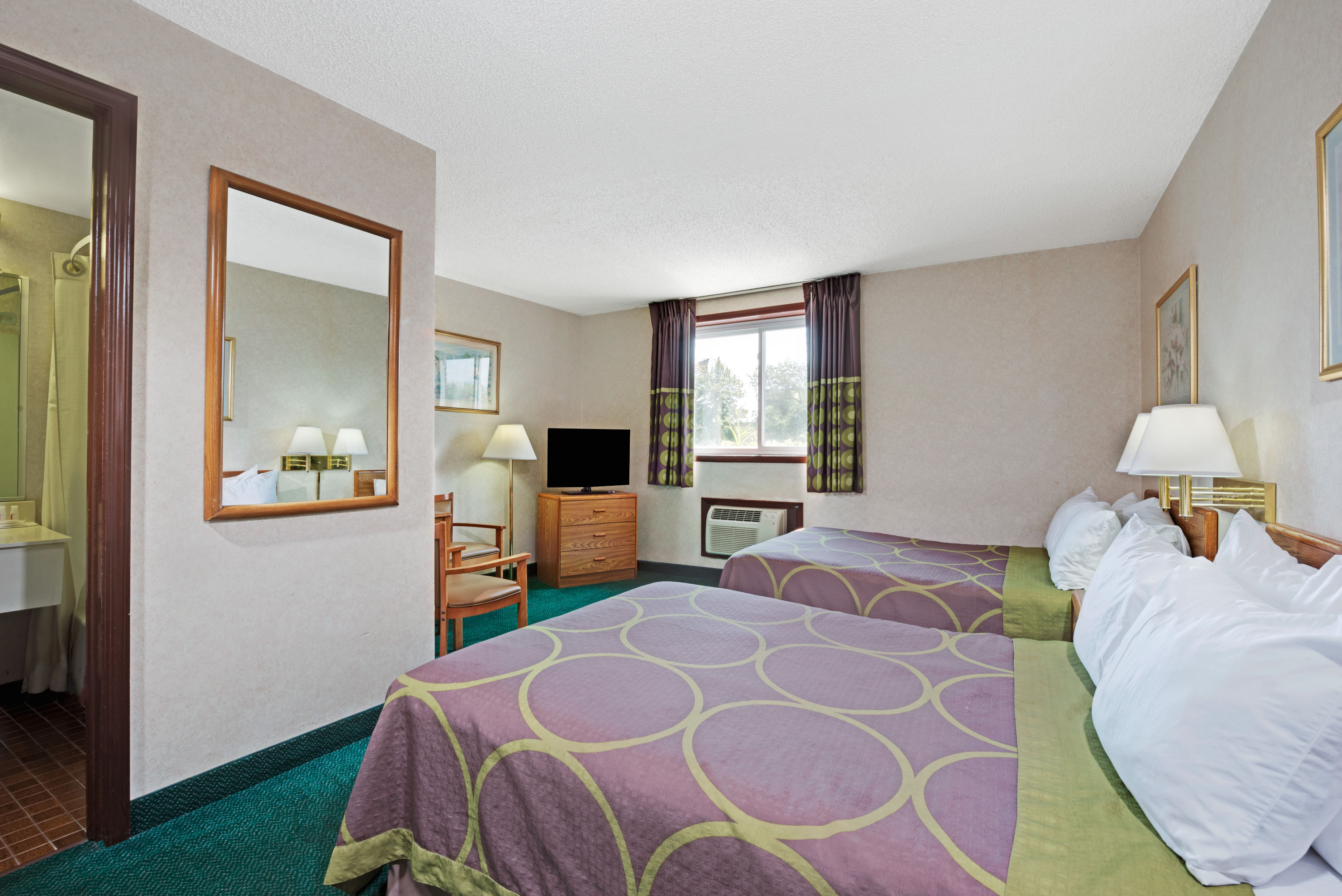 Guest room at the Super 8 by Wyndham Kenmore/Buffalo/Niagara Falls Area in Kenmore, New York