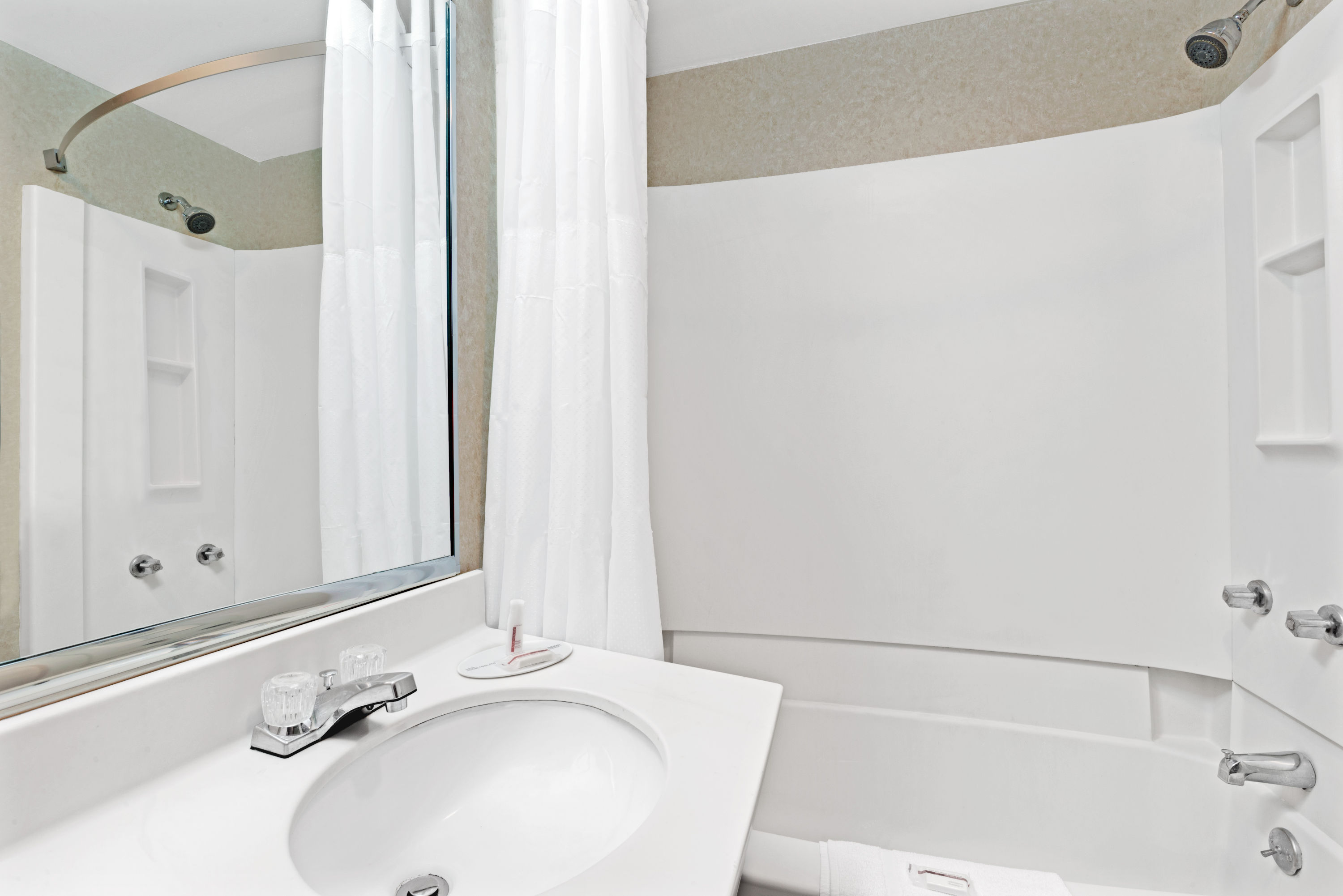 Guest room at the Super 8 by Wyndham Kenmore/Buffalo/Niagara Falls Area in Kenmore, New York