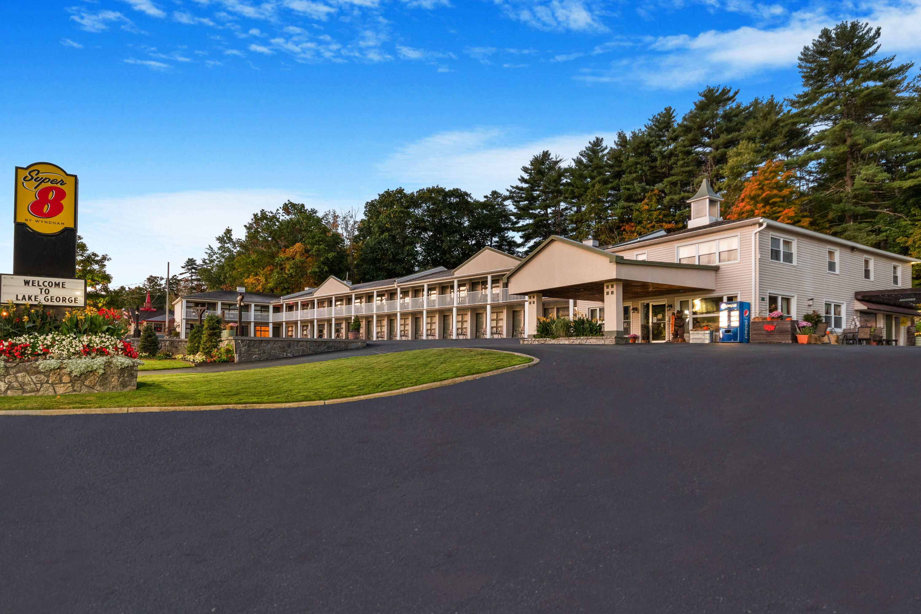 Exterior Dusk Image of Super 8 by Wyndham Lake George/Downtown hotel in Lake George, New York