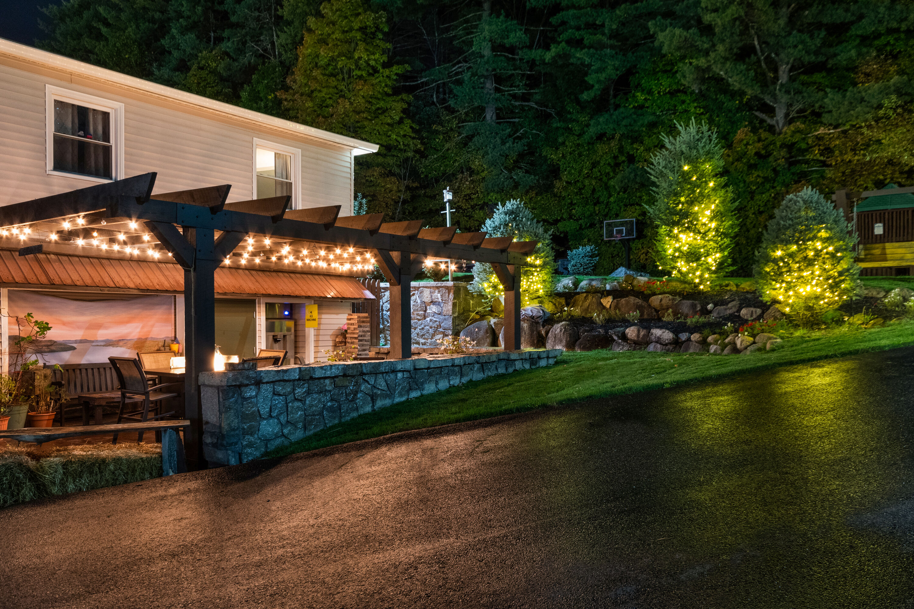 Exterior Dusk Image of Super 8 by Wyndham Lake George/Downtown hotel in Lake George, New York