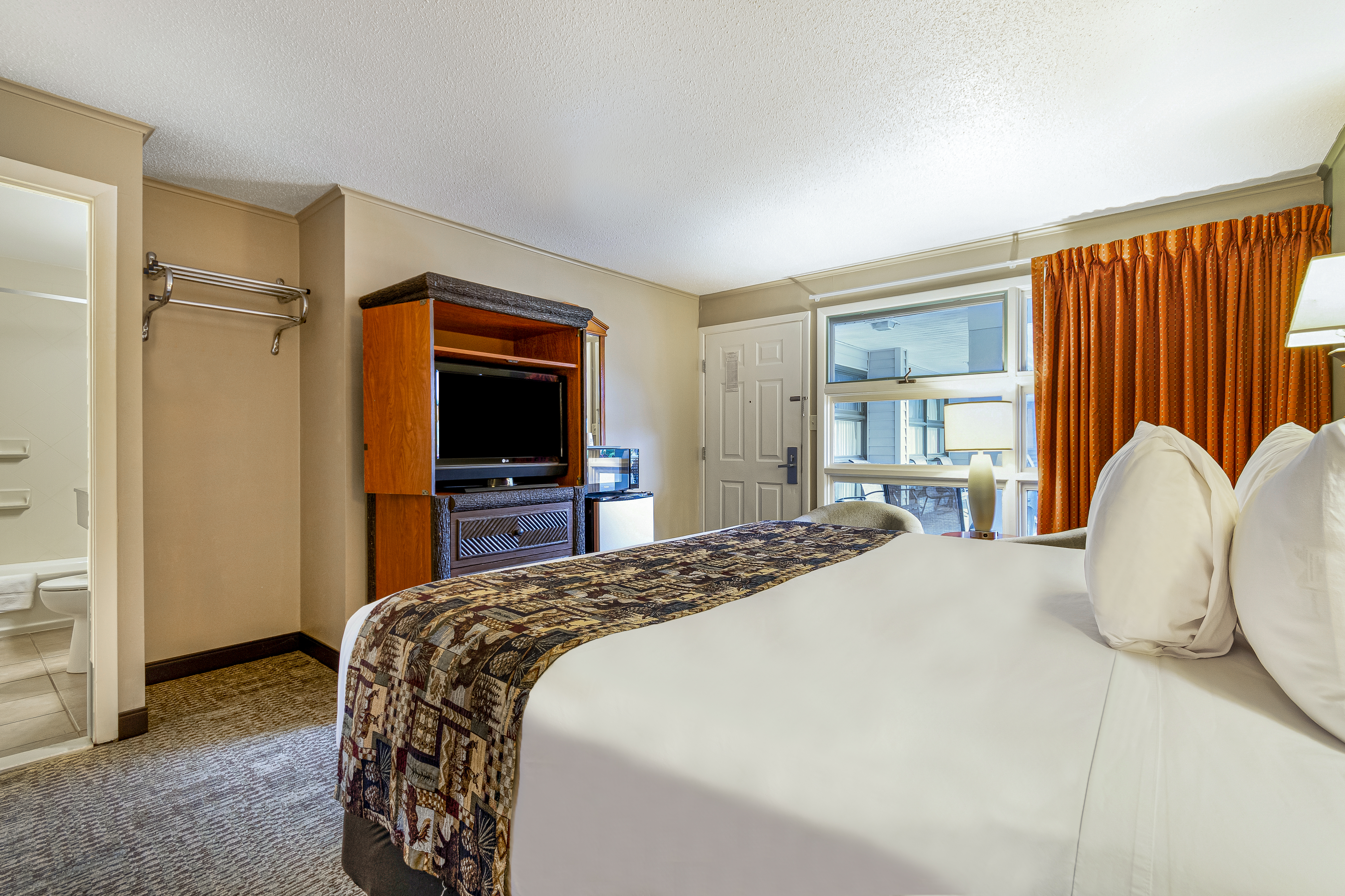 Guest room at the Super 8 by Wyndham Lake George/Downtown in Lake George, New York