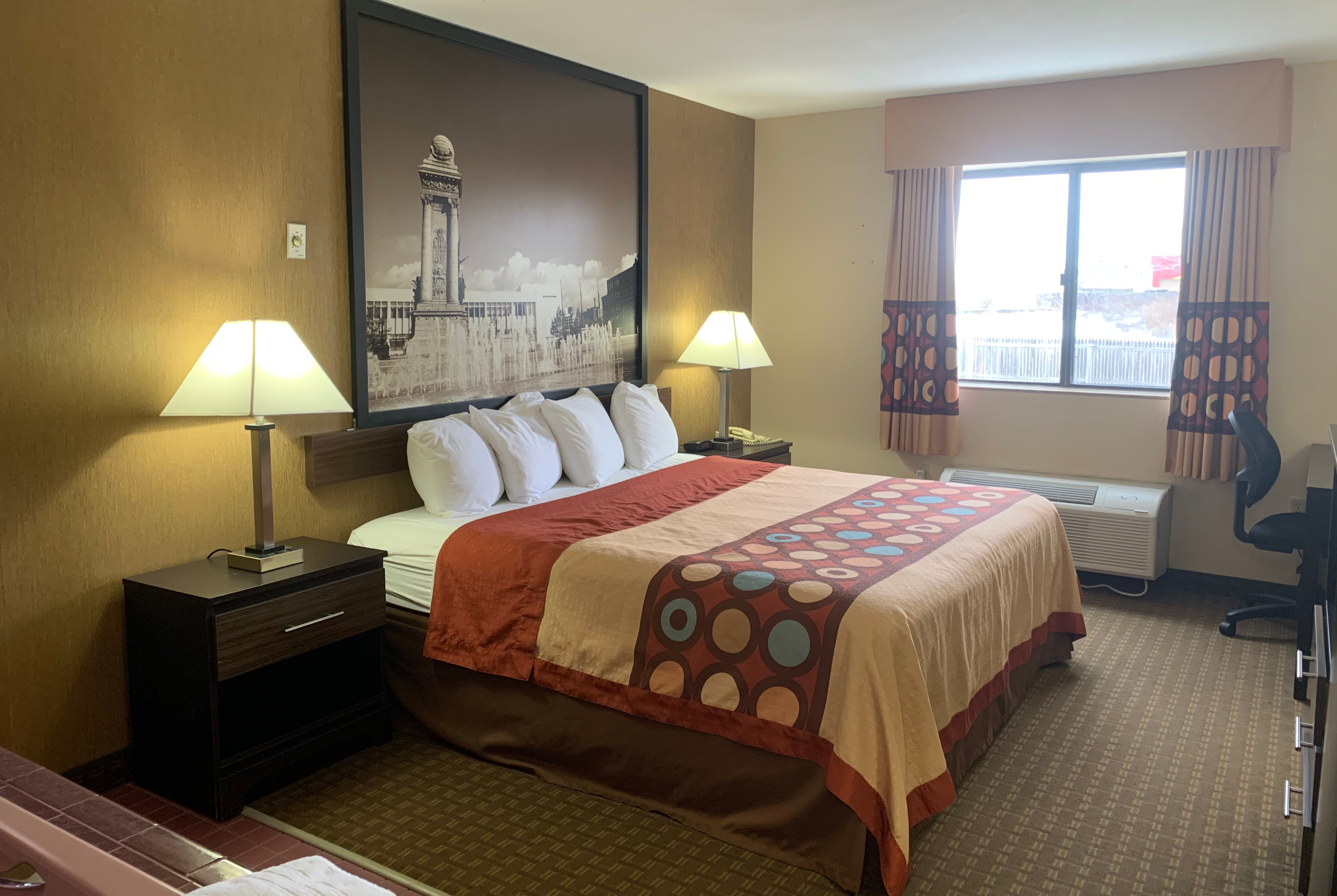 Guest room at the Super 8 by Wyndham Liverpool/Clay/Syracuse Area in Liverpool, New York