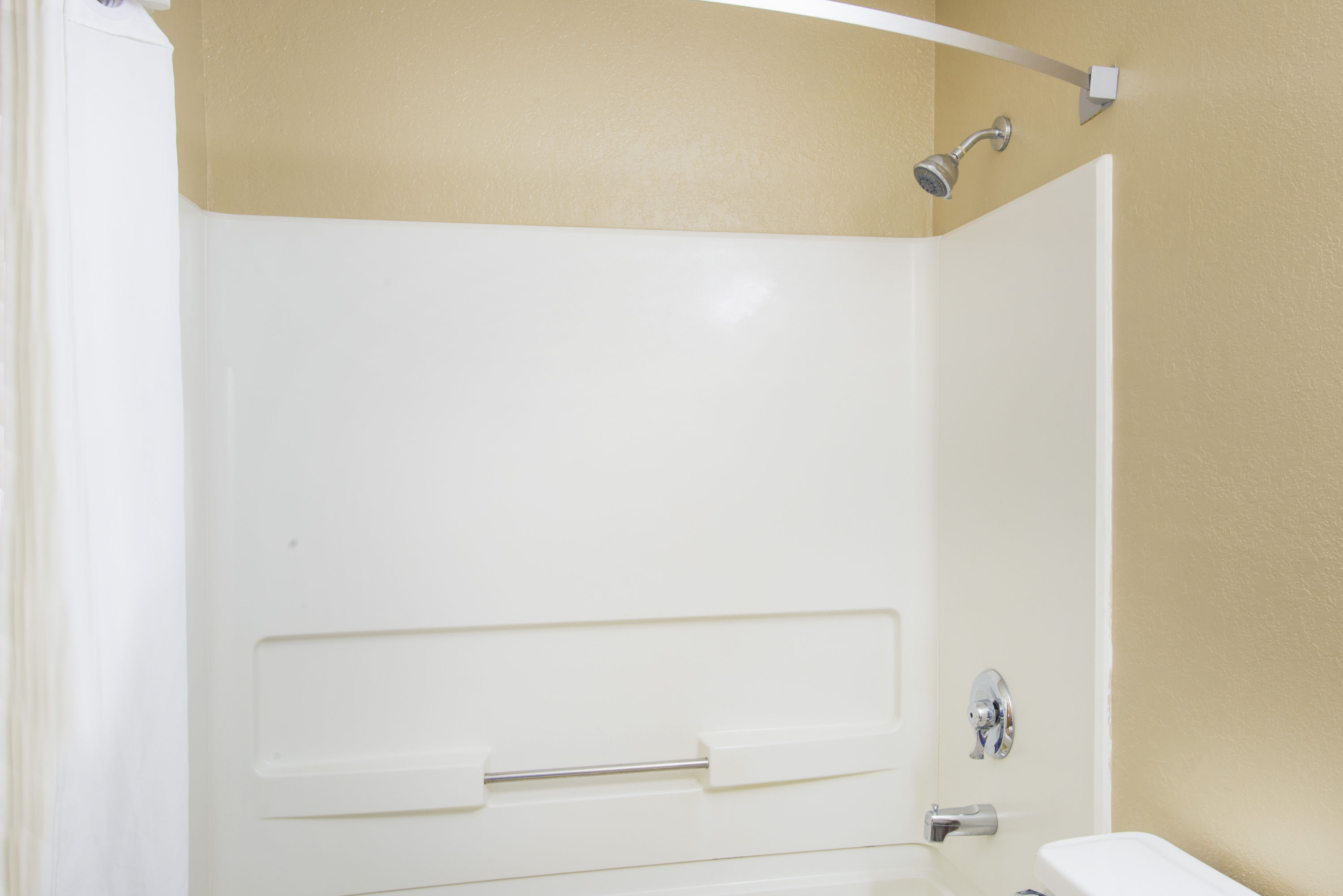 Guest room bath at the Super 8 by Wyndham Massena NY in Massena, New York