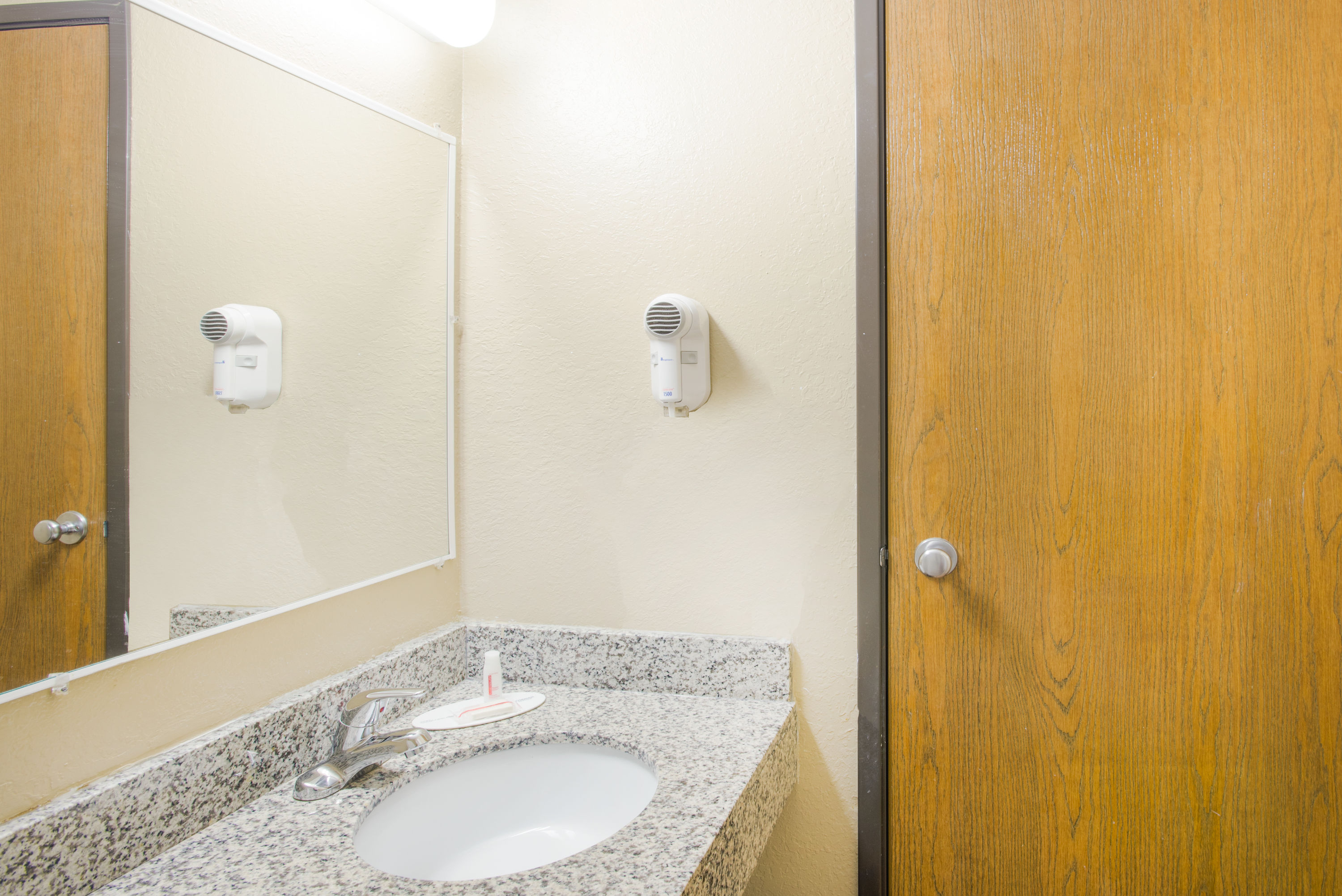 Guest room bath at the Super 8 by Wyndham Massena NY in Massena, New York