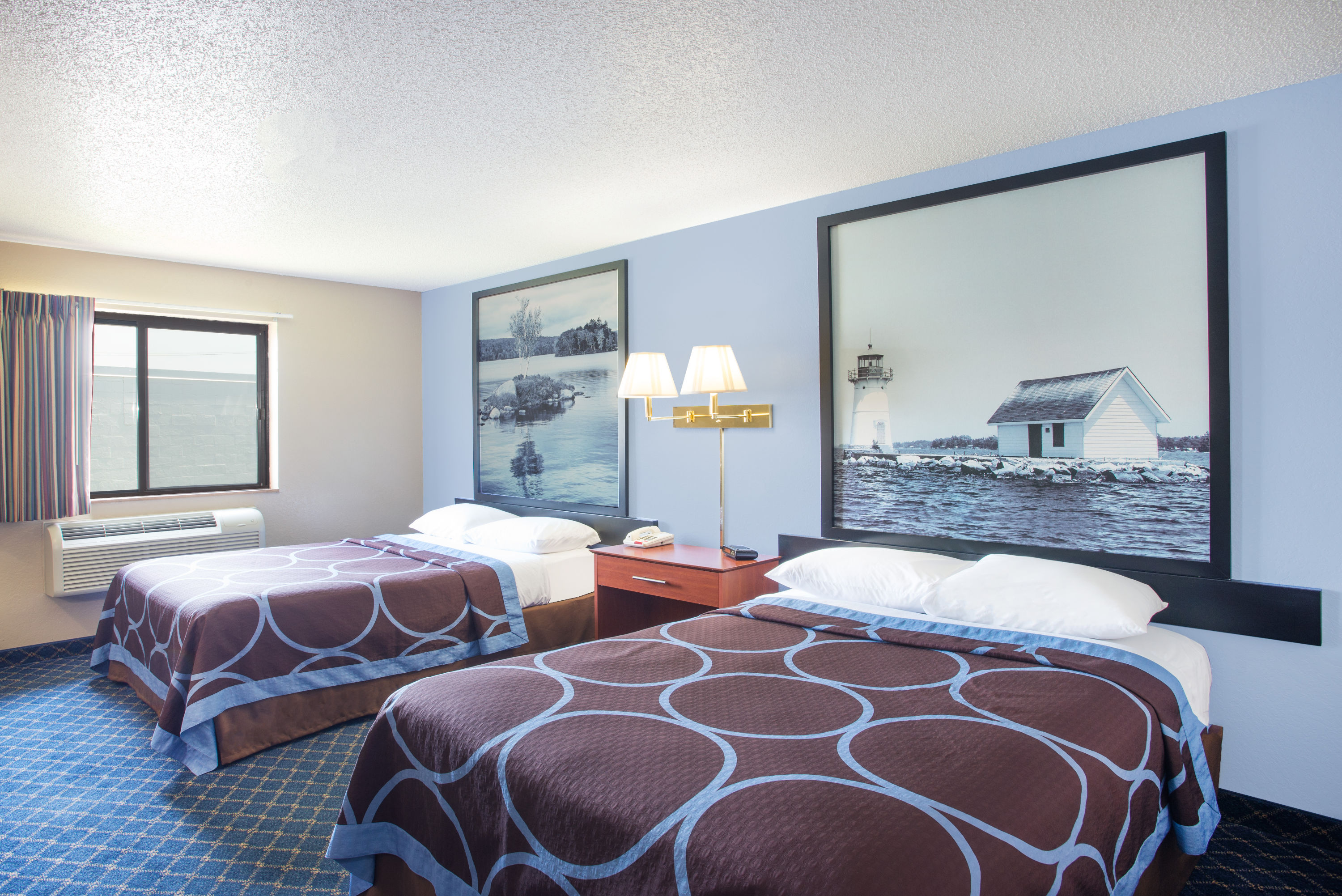 Guest room at the Super 8 by Wyndham Massena NY in Massena, New York