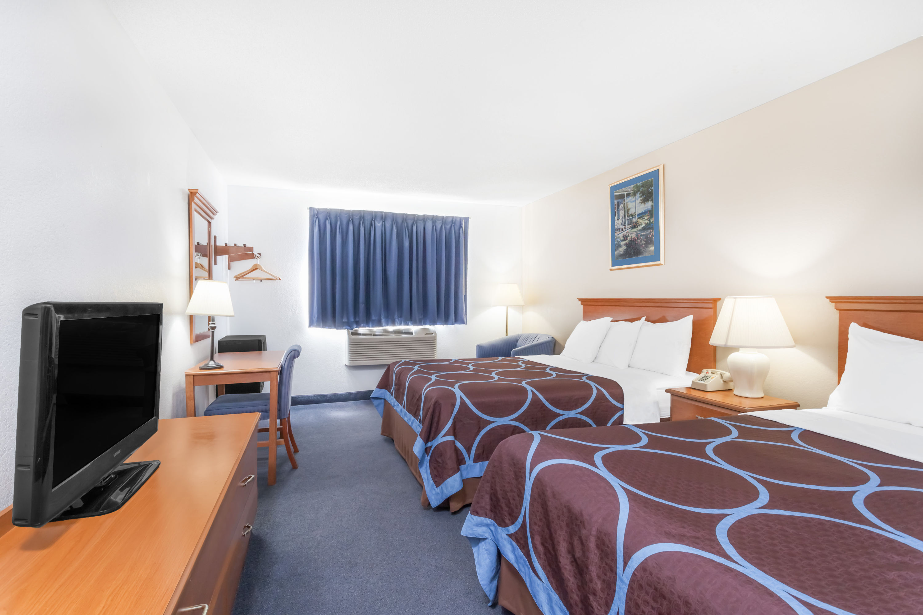 Guest room at the Super 8 by Wyndham Montgomery Maybrook in Montgomery, New York