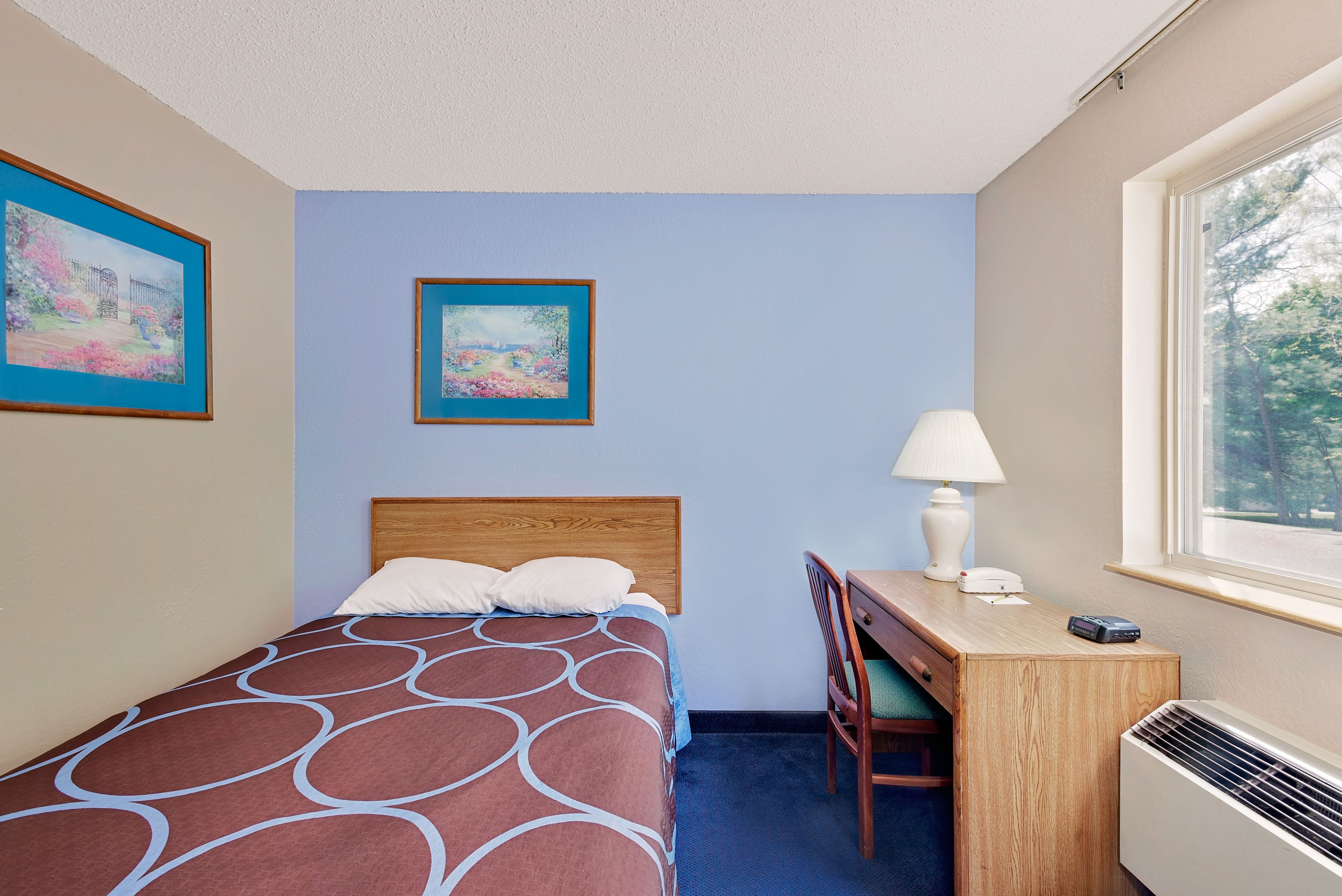 Guest room at the Super 8 by Wyndham Newburgh/West Point Near Stewart Airport in Newburgh, New York