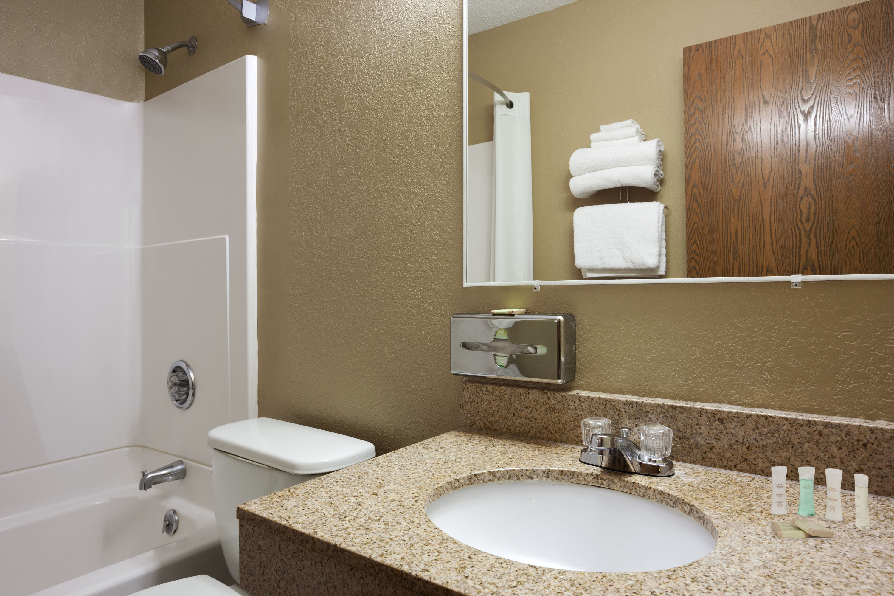 Guest room bath at the Super 8 by Wyndham Pulaski in Pulaski, New York
