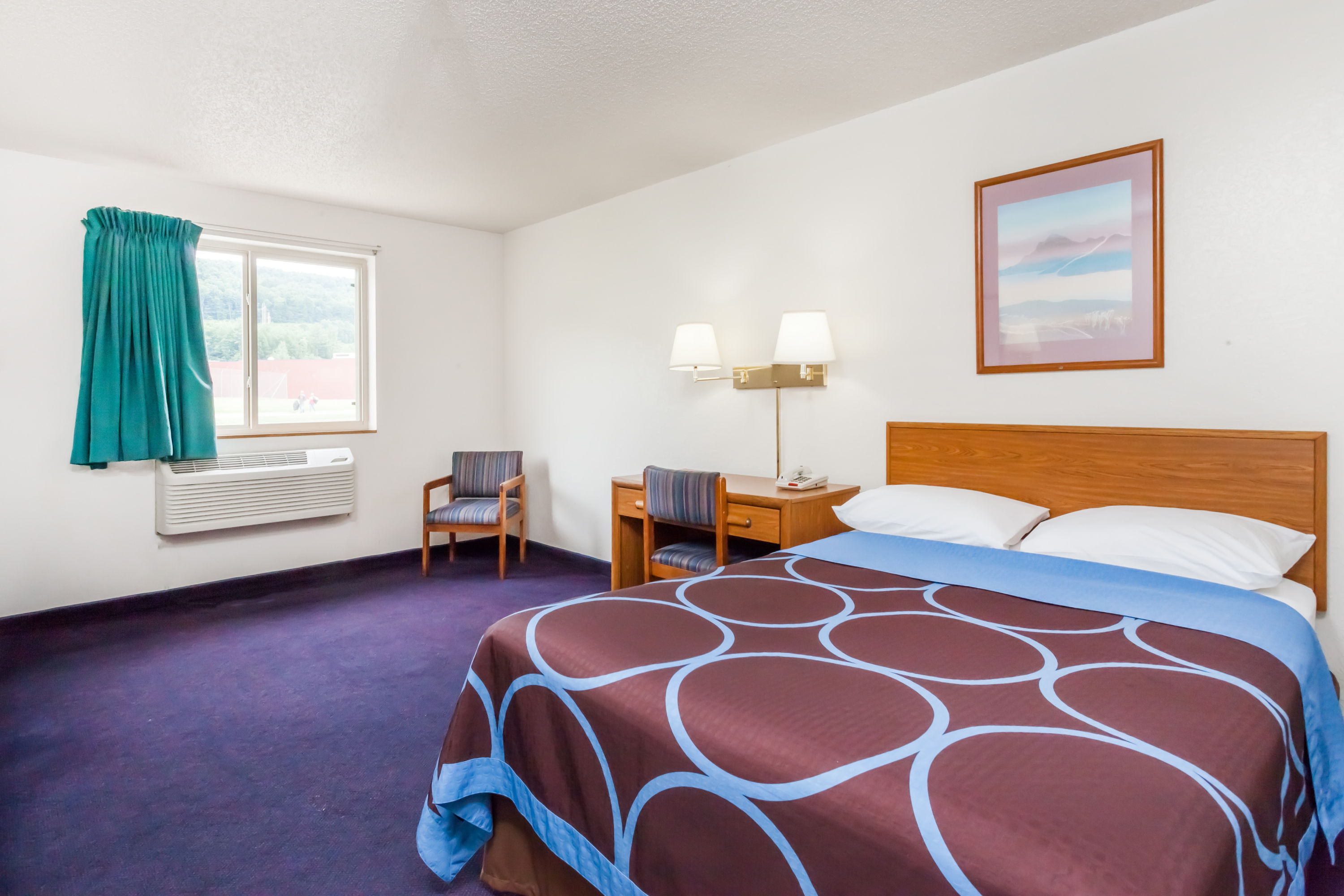 Guest room at the Super 8 by Wyndham Sidney NY in Sidney, New York