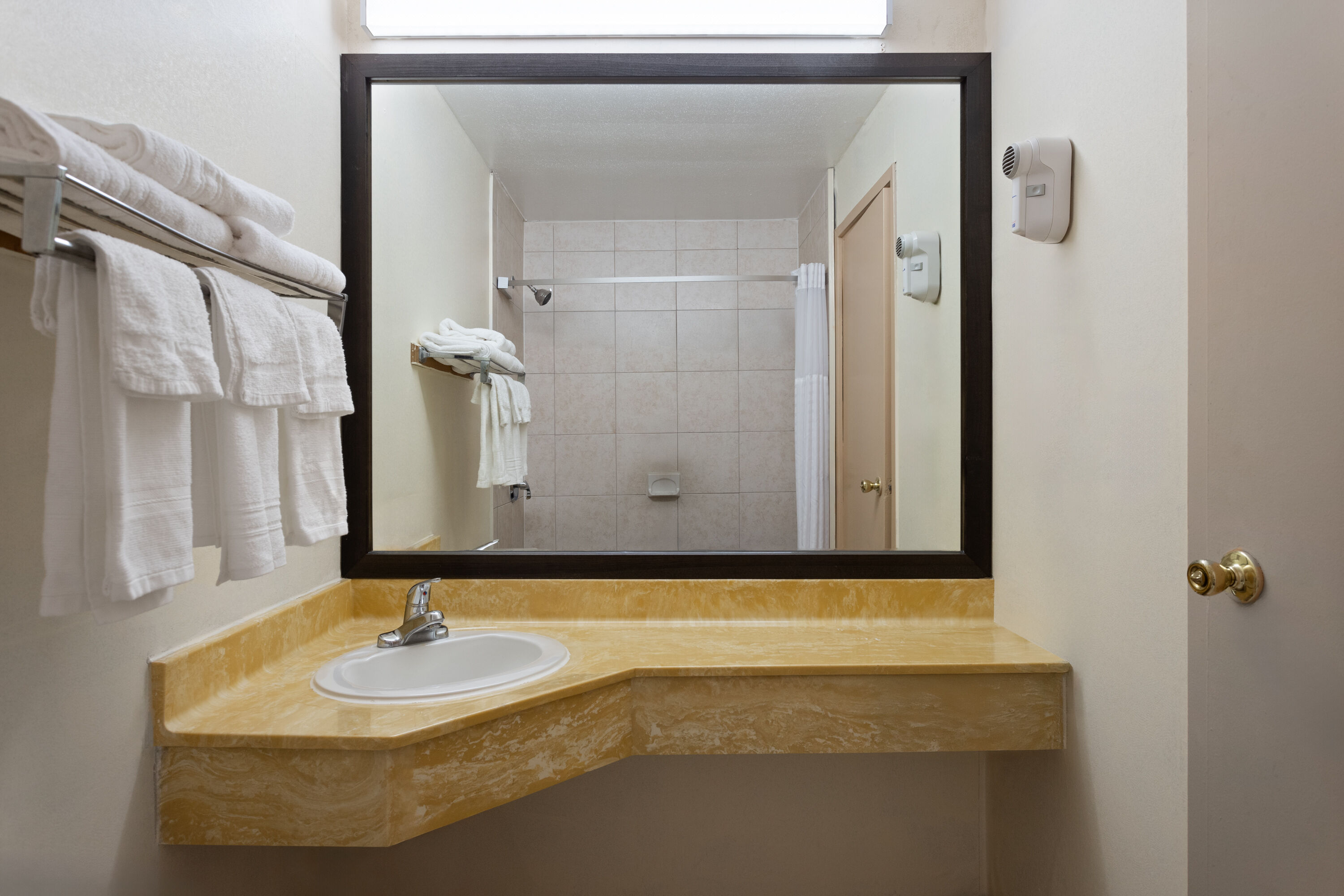 Guest room bath at the Super 8 by Wyndham Columbus in Columbus, Ohio