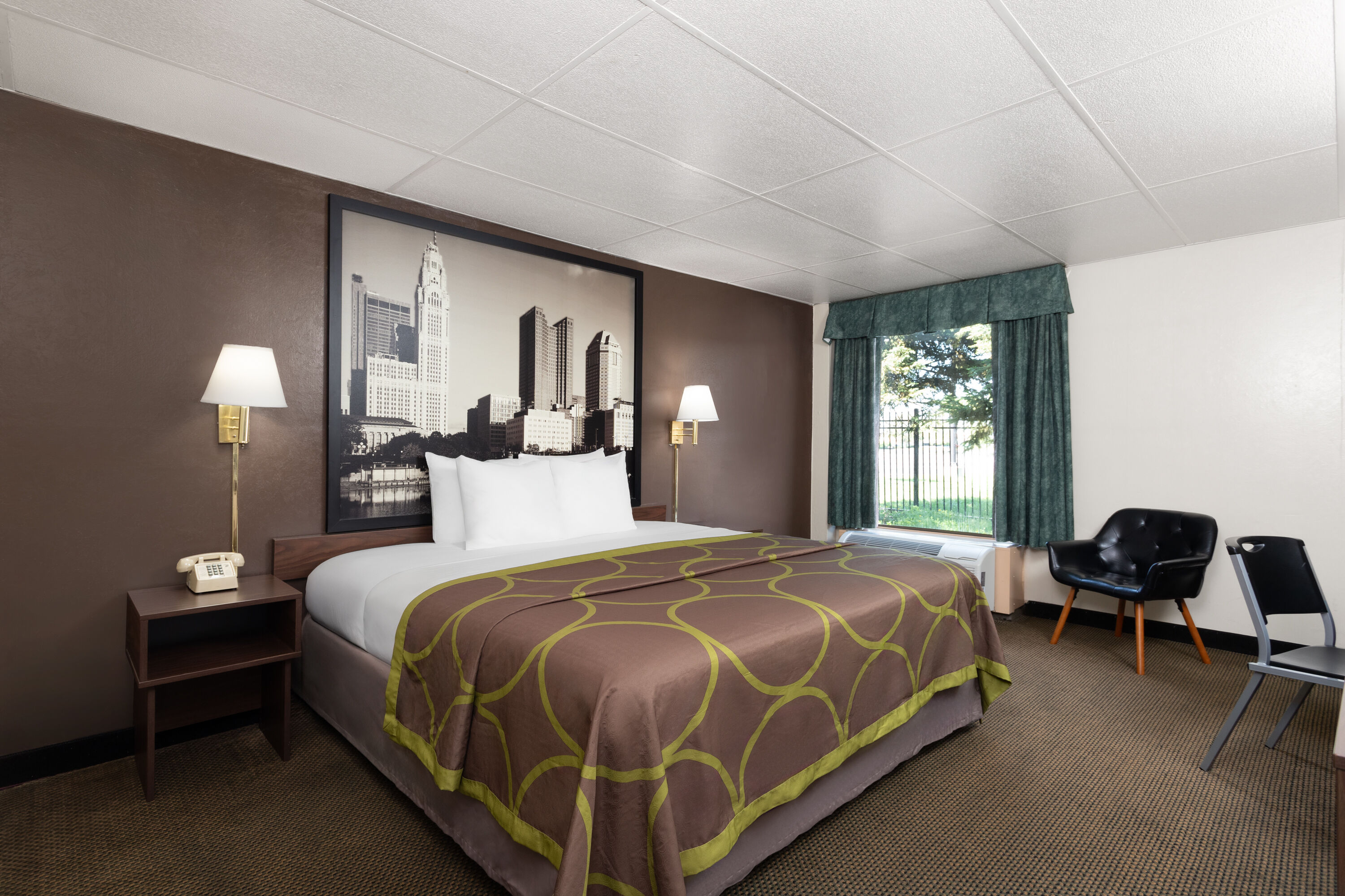 Guest room at the Super 8 by Wyndham Columbus in Columbus, Ohio