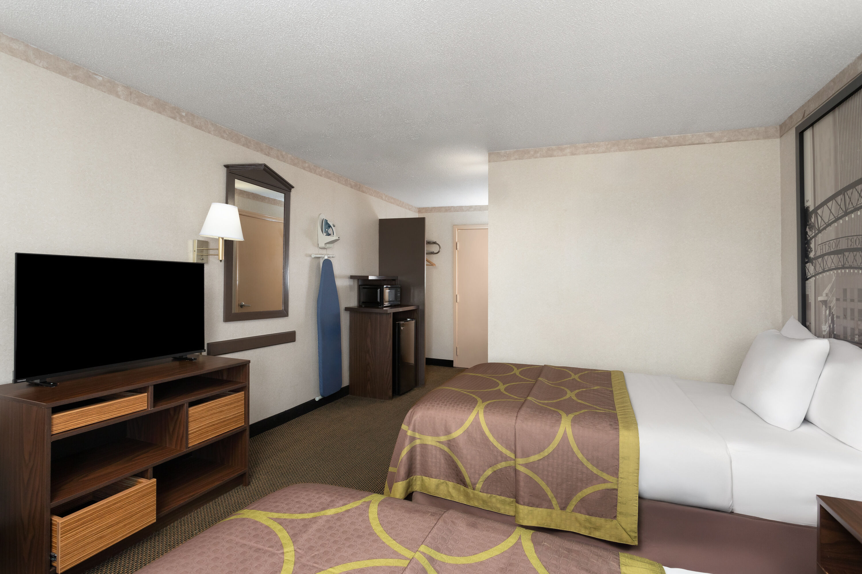 Guest room at the Super 8 by Wyndham Columbus in Columbus, Ohio