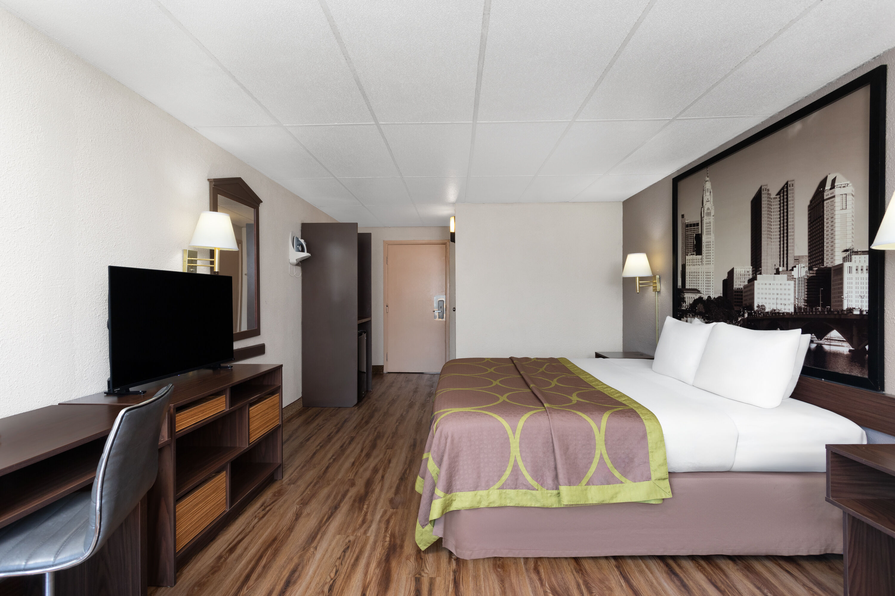 Guest room at the Super 8 by Wyndham Columbus in Columbus, Ohio