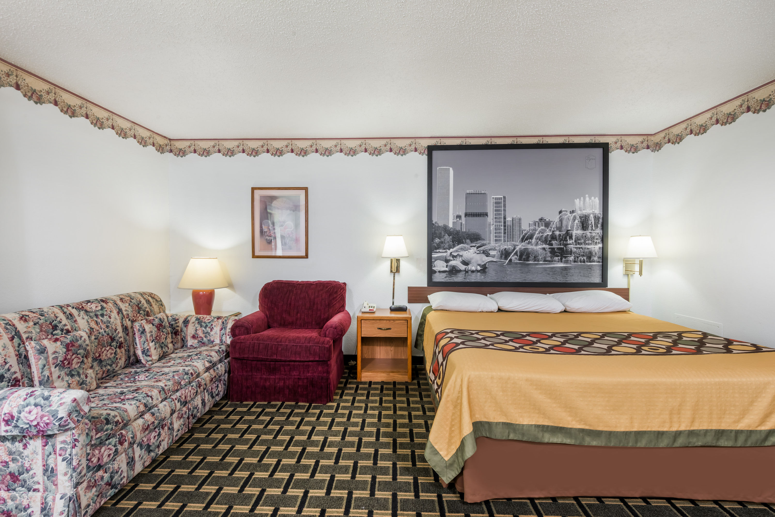Guest room at the Super 8 by Wyndham Coshocton Roscoe Village in Coshocton, Ohio