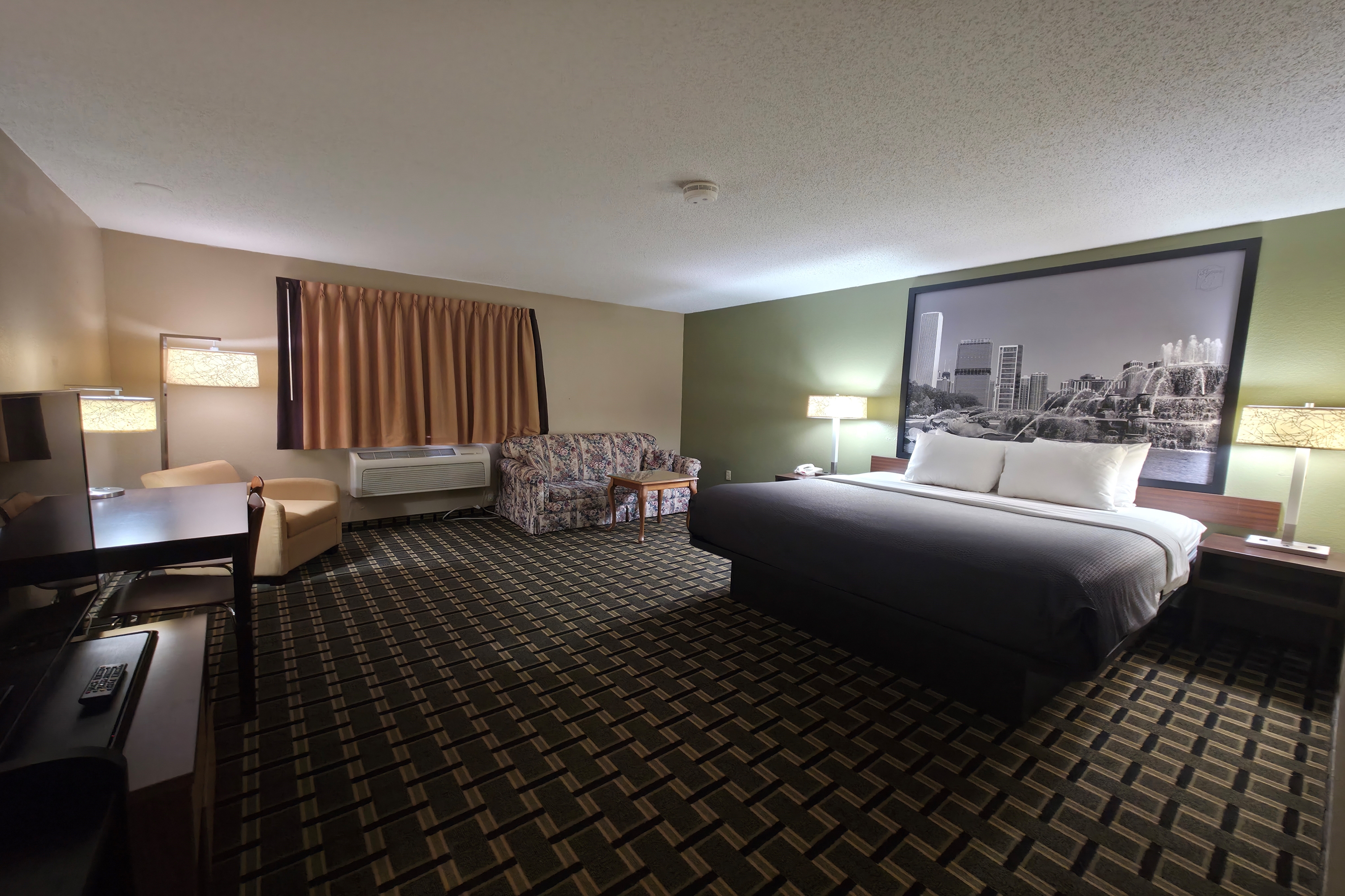 Guest room at the Super 8 by Wyndham Coshocton Roscoe Village in Coshocton, Ohio