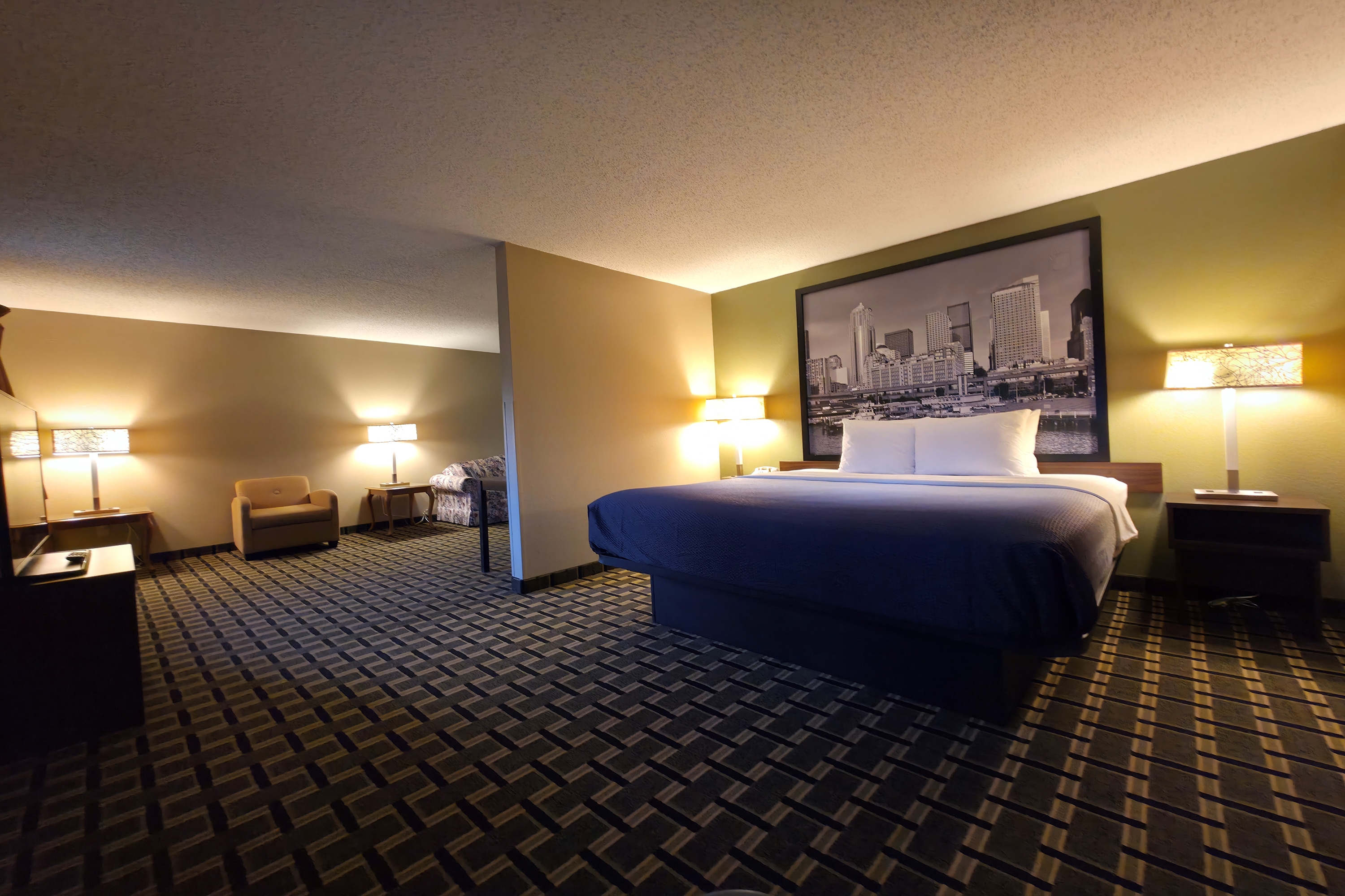 Guest room at the Super 8 by Wyndham Coshocton Roscoe Village in Coshocton, Ohio