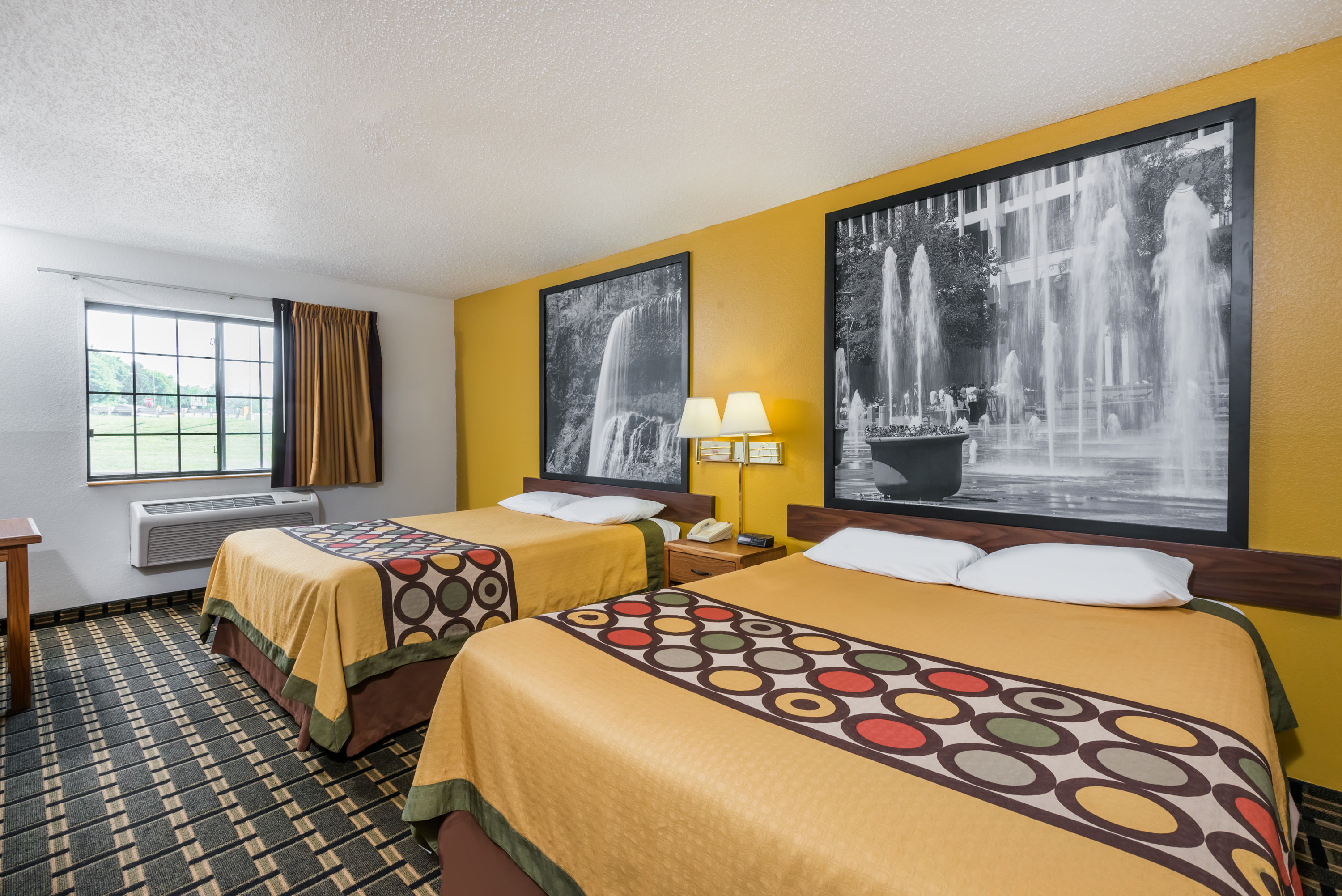 Double bed guest room at the Super 8 by Wyndham Coshocton Roscoe Village in Coshocton, Ohio