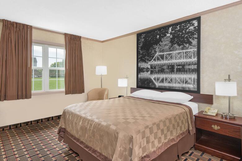 Guest room at the Super 8 Maumee Perrysburg Toledo Area in Maumee, Ohio
