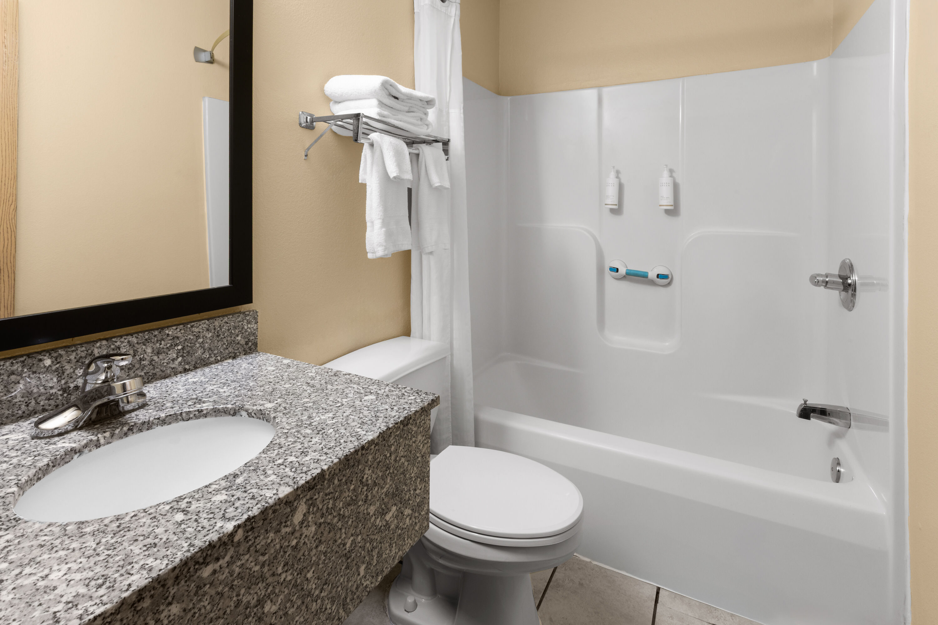 Guest room bath at the Super 8 by Wyndham Medina in Medina, Ohio