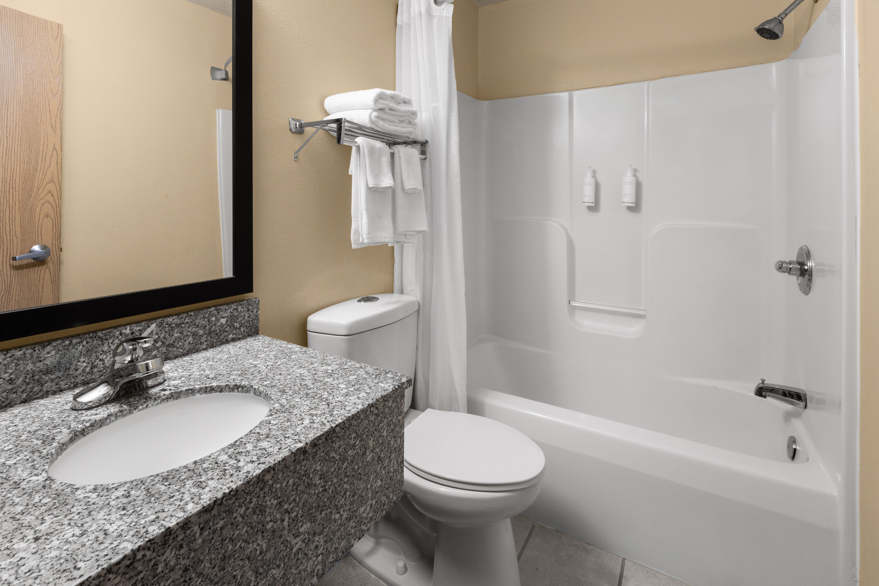 Guest room bath at the Super 8 by Wyndham Medina in Medina, Ohio