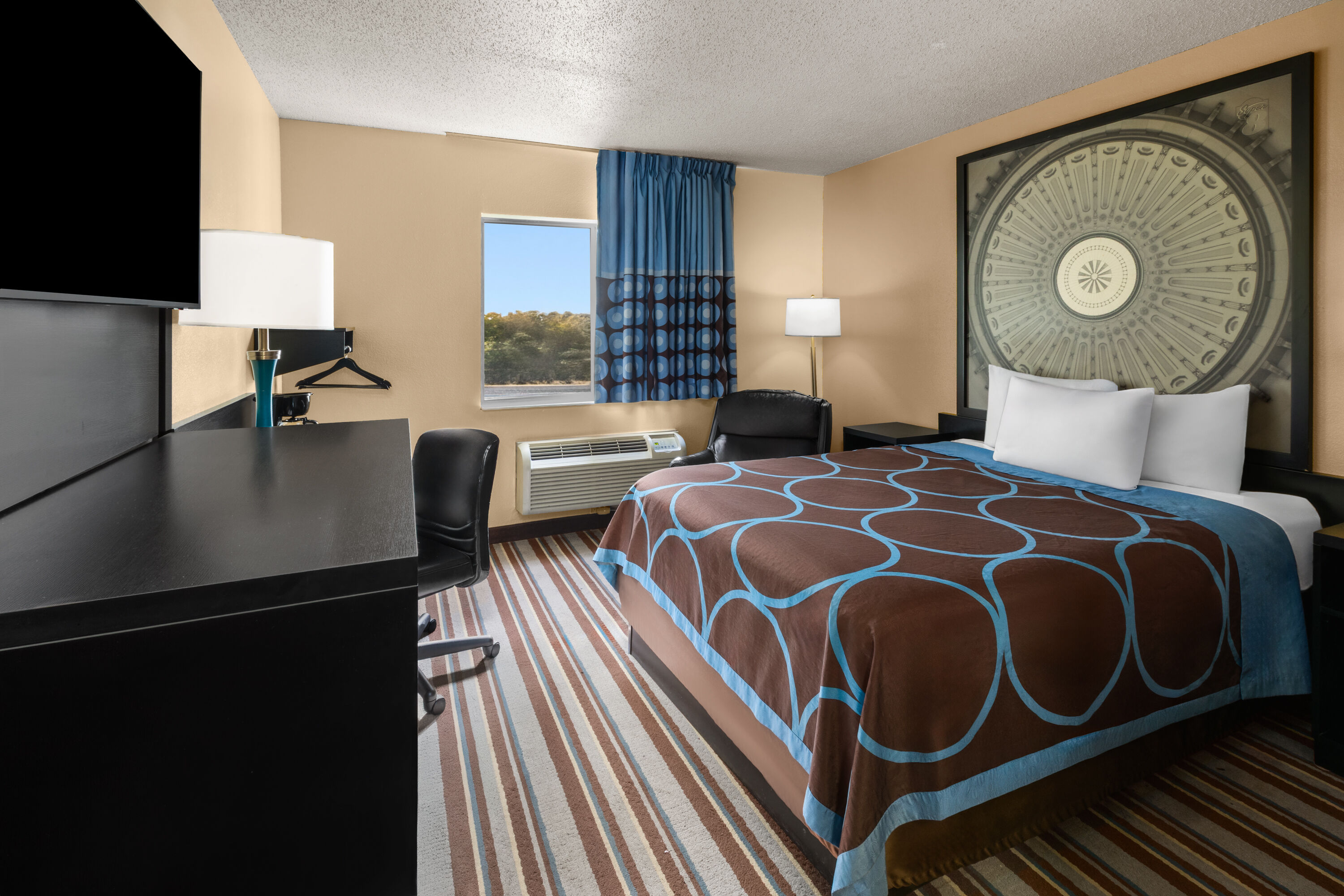Guest room at the Super 8 by Wyndham Medina in Medina, Ohio