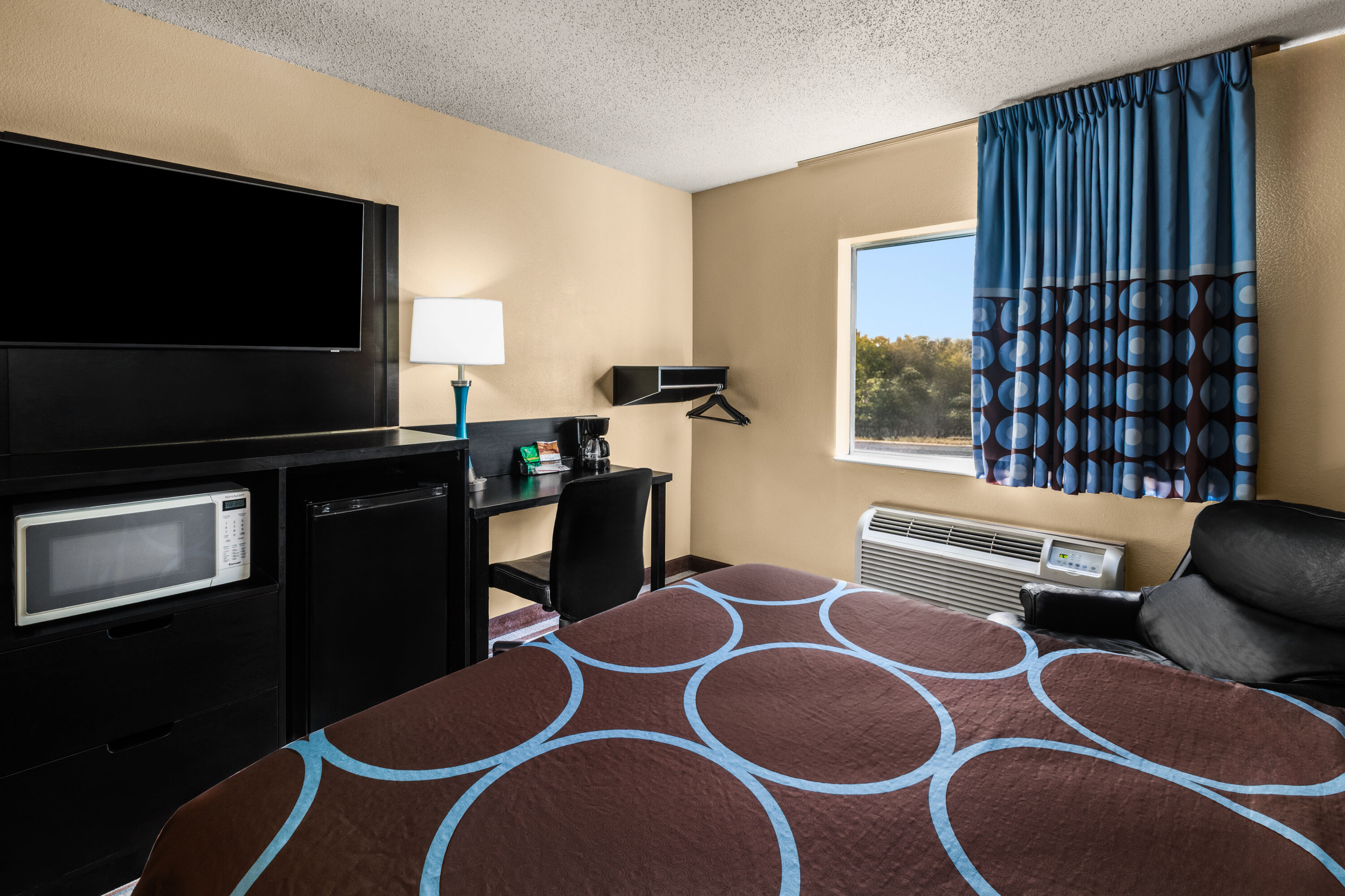 Guest room at the Super 8 by Wyndham Medina in Medina, Ohio