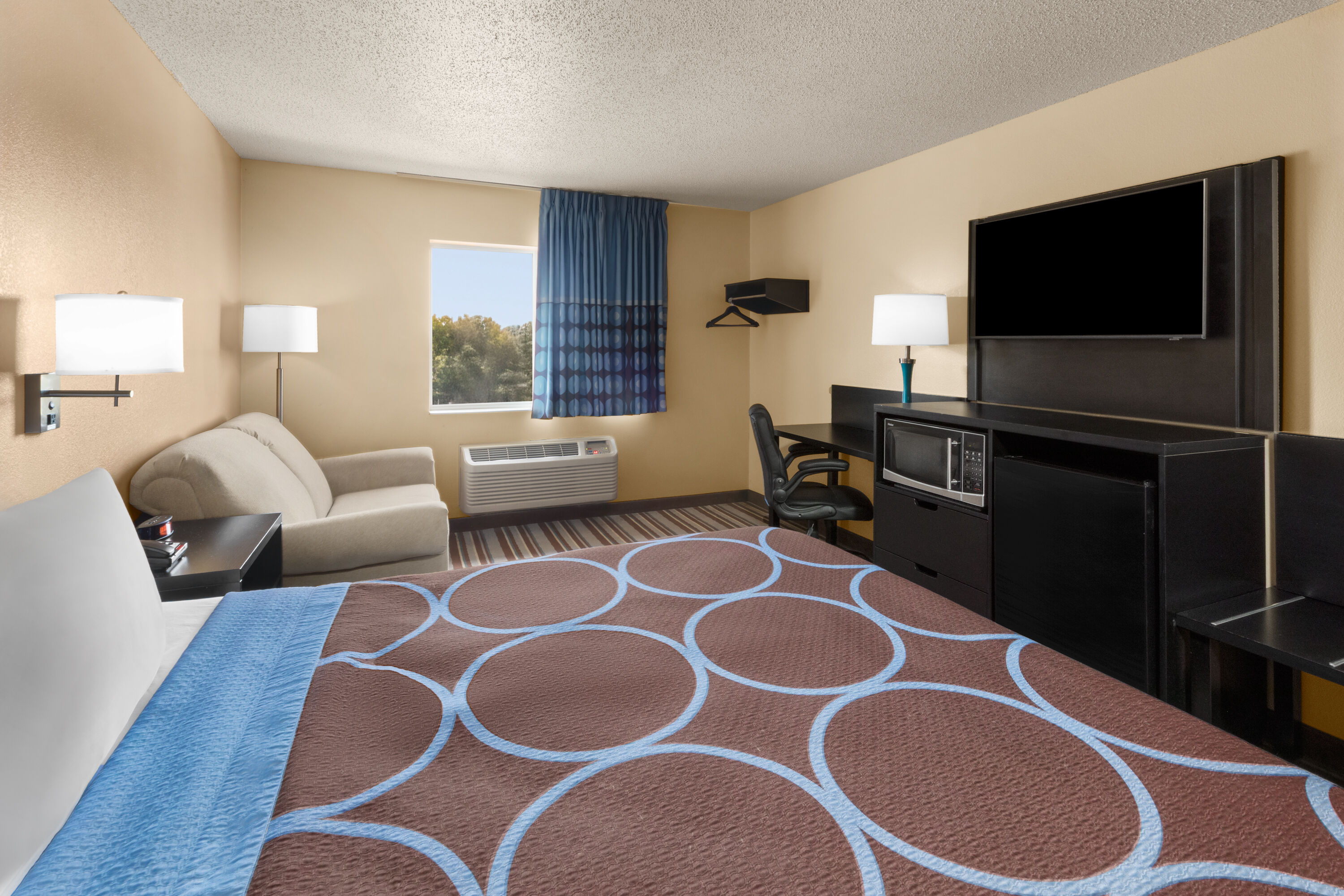Guest room at the Super 8 by Wyndham Medina in Medina, Ohio