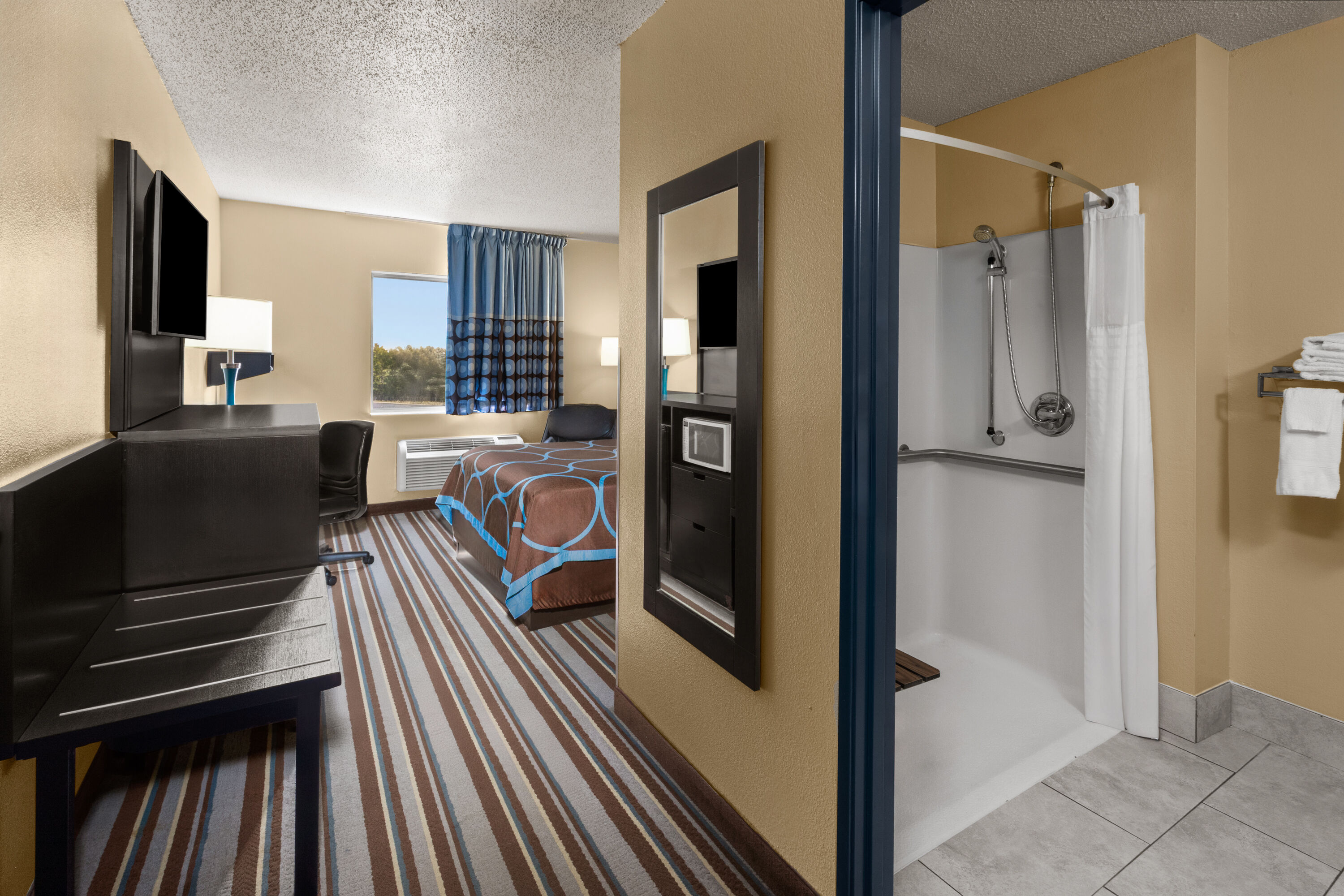 Guest room at the Super 8 by Wyndham Medina in Medina, Ohio