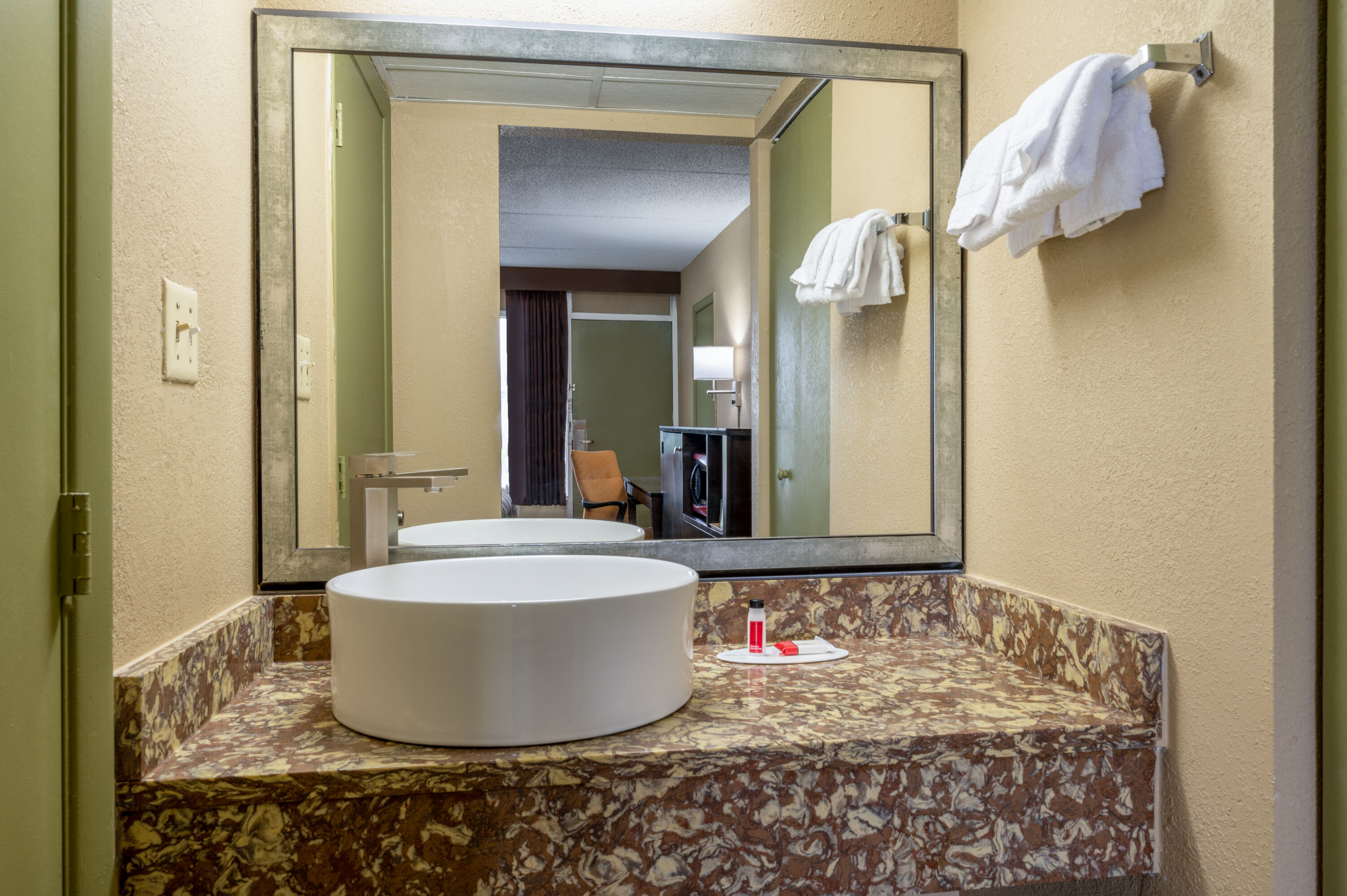 Guest room bath at the Super 8 by Wyndham Perrysburg/Toledo in Perrysburg, Ohio