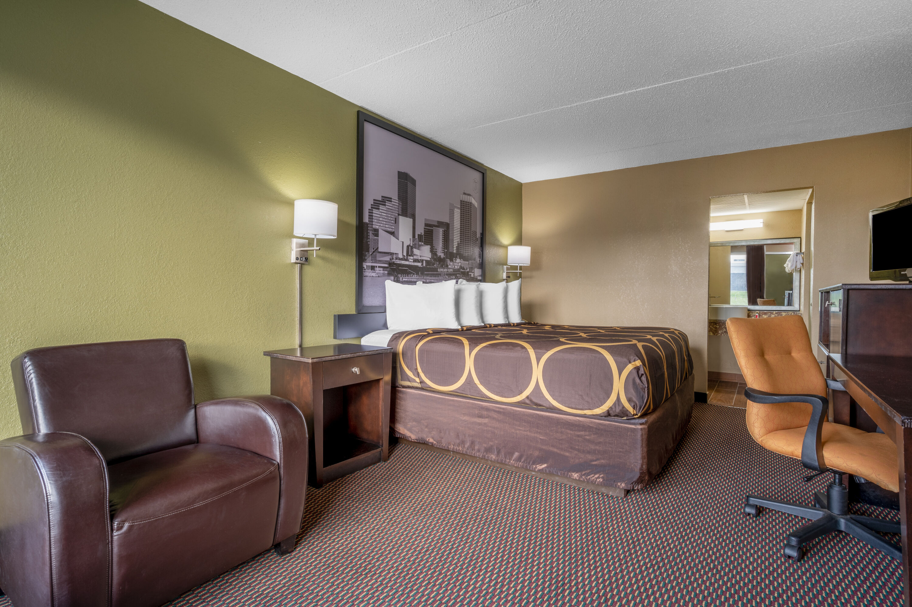 Guest room at the Super 8 by Wyndham Perrysburg/Toledo in Perrysburg, Ohio