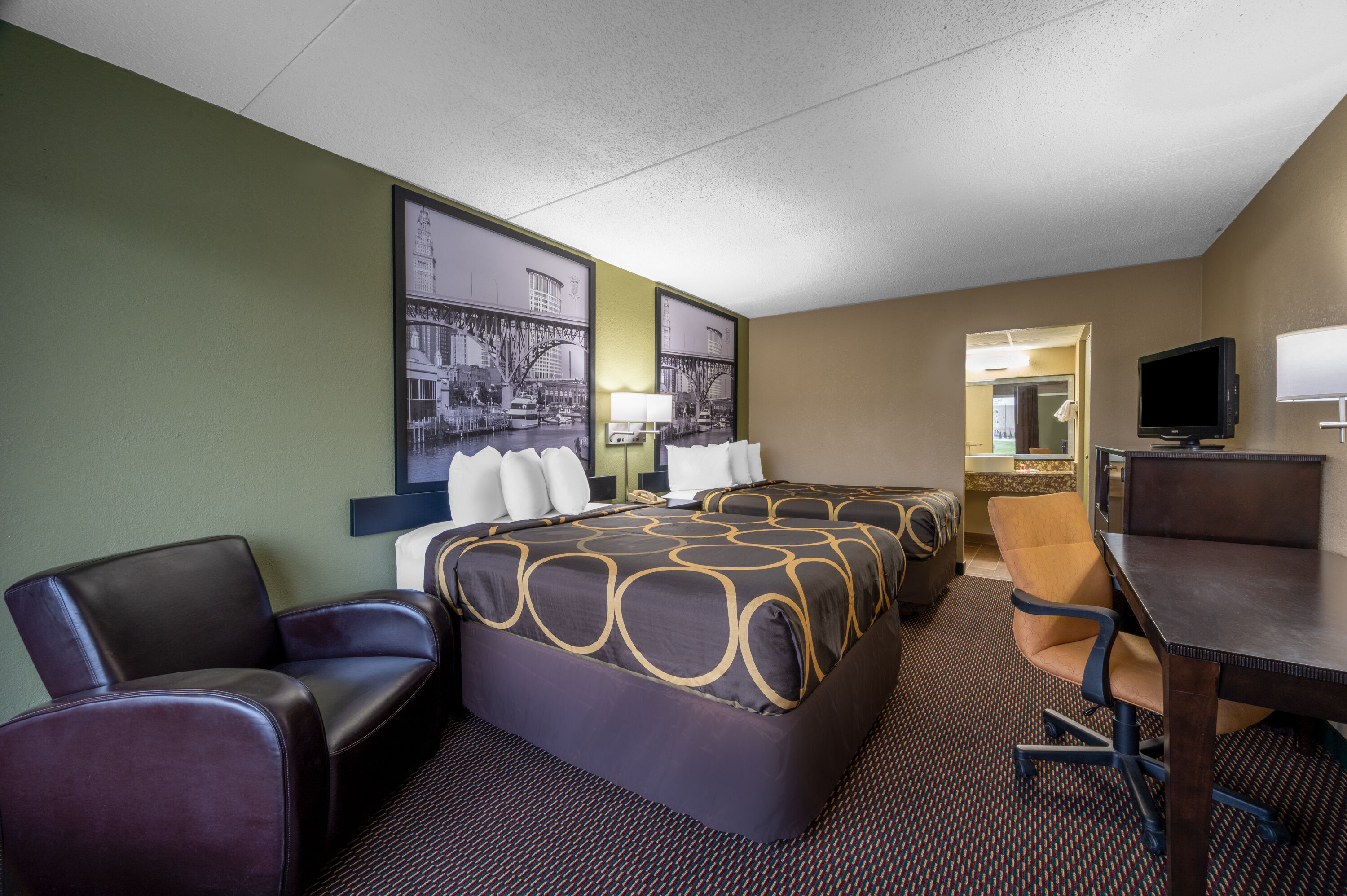 Guest room at the Super 8 by Wyndham Perrysburg/Toledo in Perrysburg, Ohio