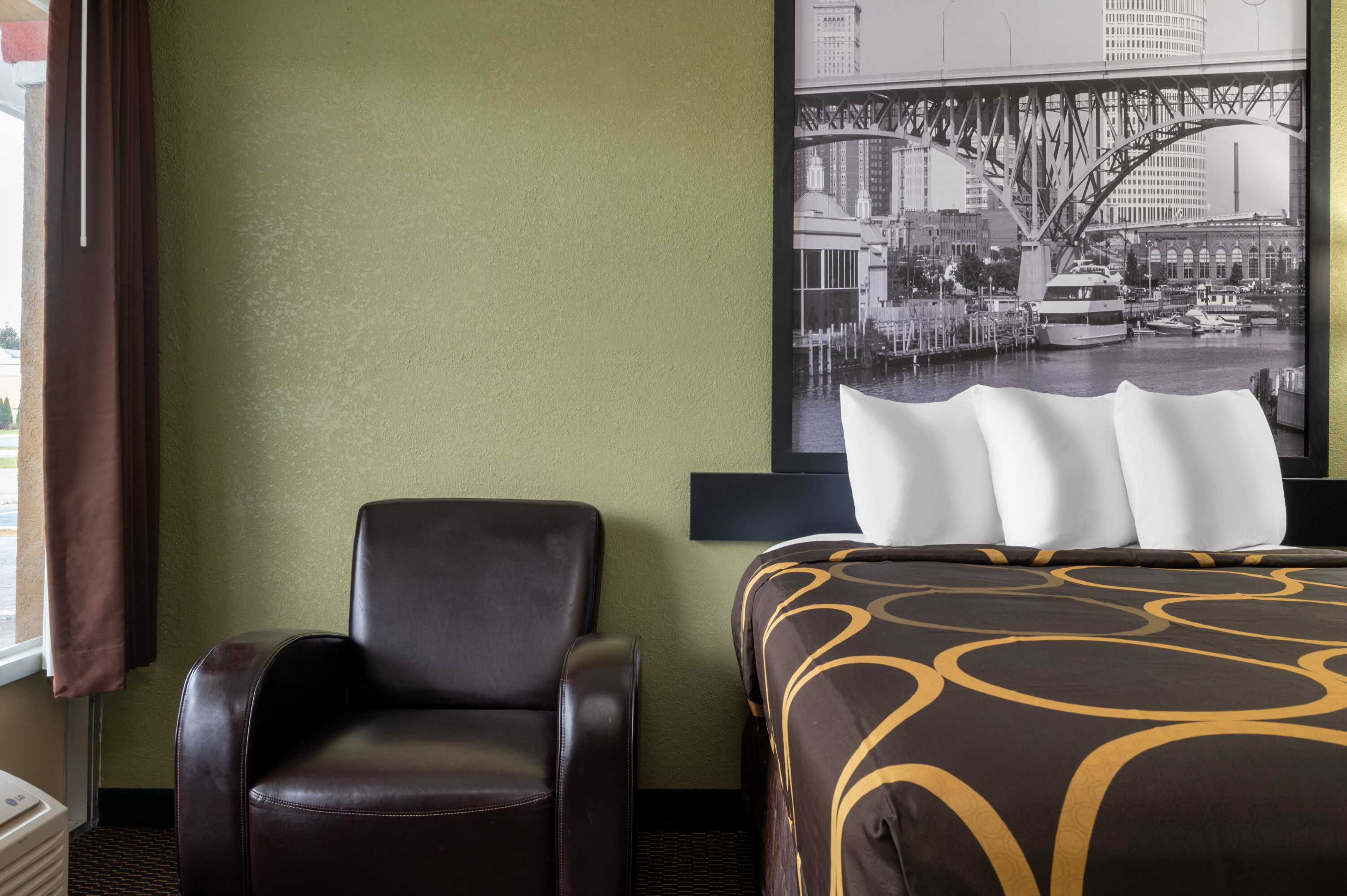 Guest room at the Super 8 by Wyndham Perrysburg/Toledo in Perrysburg, Ohio