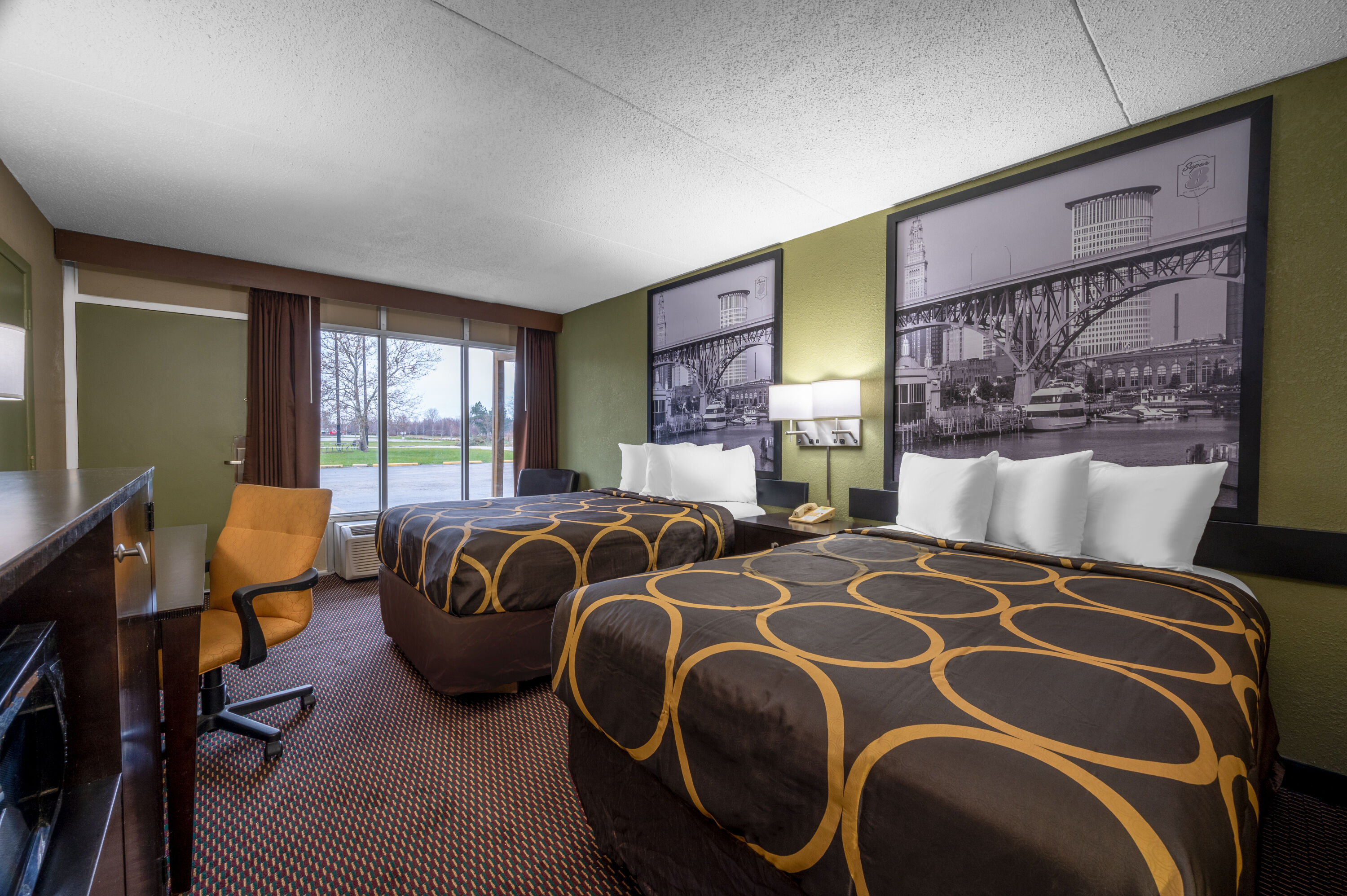Guest room at the Super 8 by Wyndham Perrysburg/Toledo in Perrysburg, Ohio