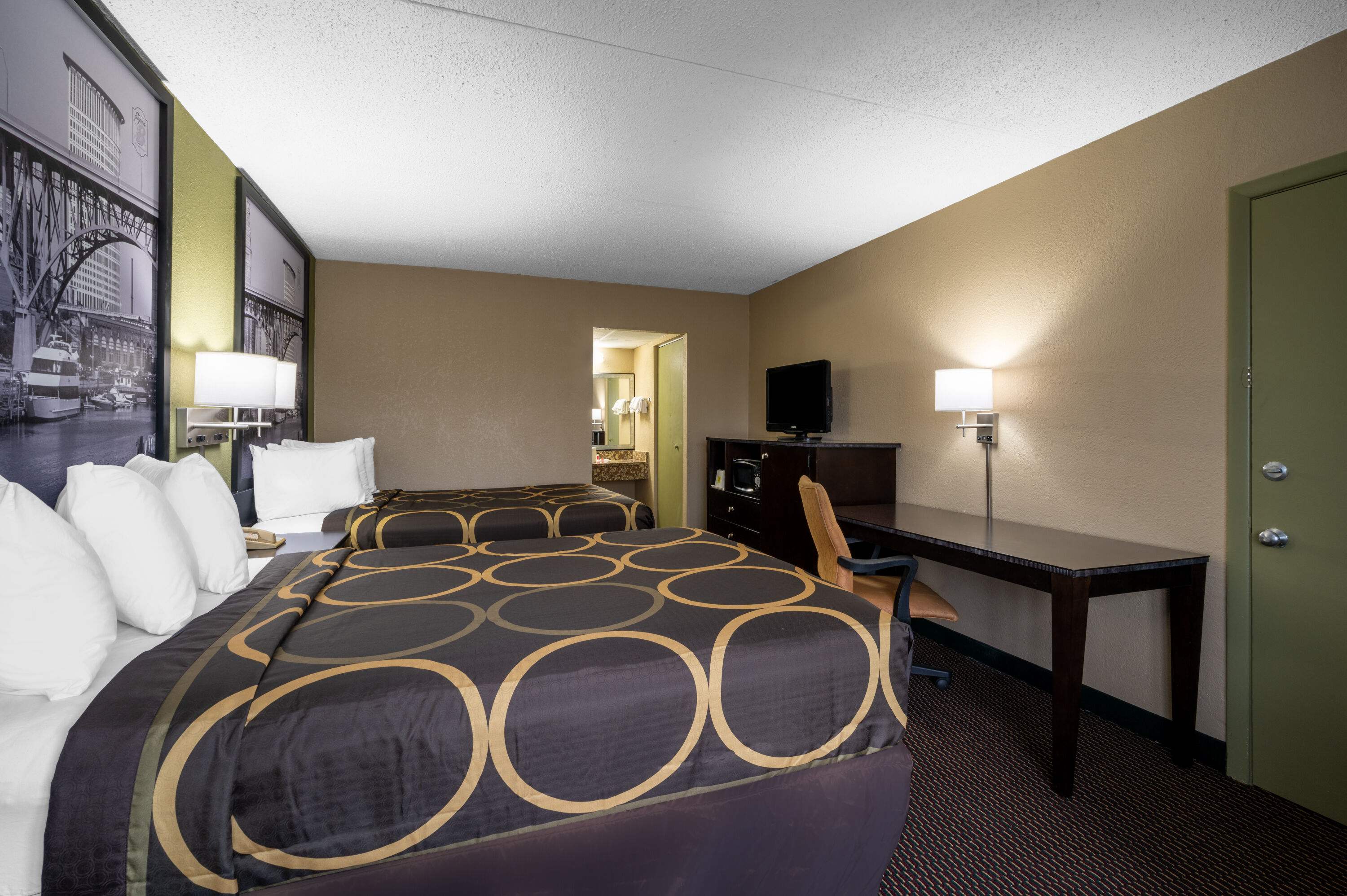 Guest room at the Super 8 by Wyndham Perrysburg/Toledo in Perrysburg, Ohio