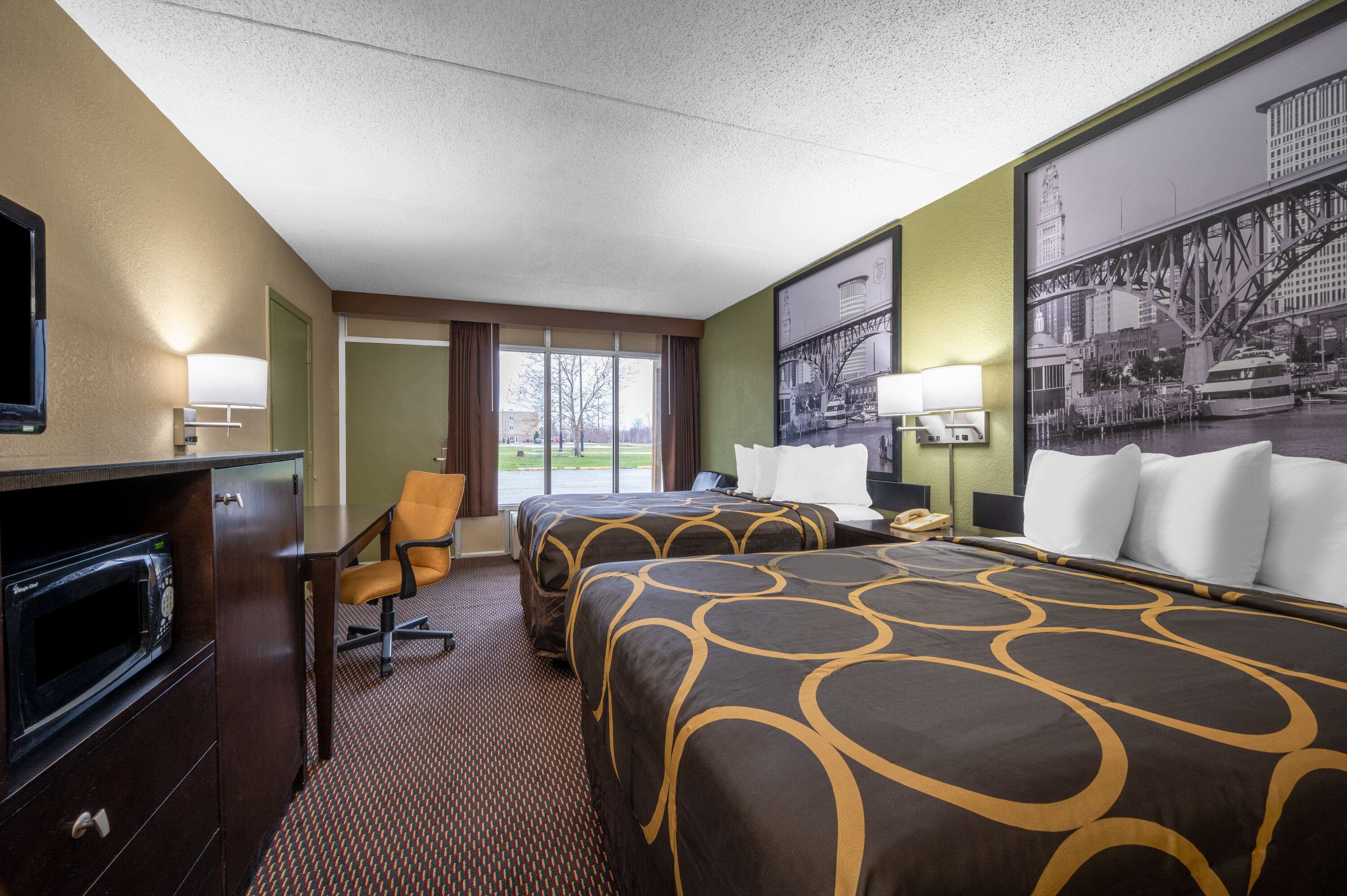 Guest room at the Super 8 by Wyndham Perrysburg/Toledo in Perrysburg, Ohio