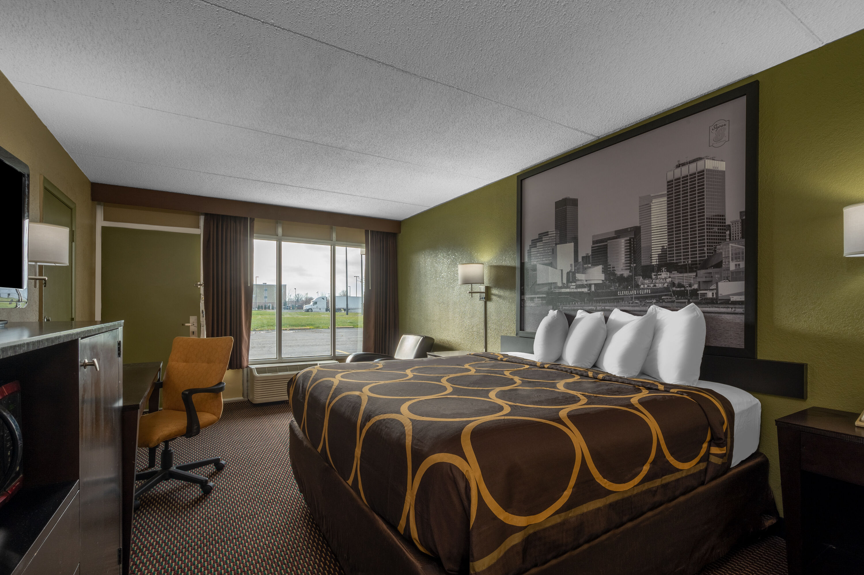 Guest room at the Super 8 by Wyndham Perrysburg/Toledo in Perrysburg, Ohio