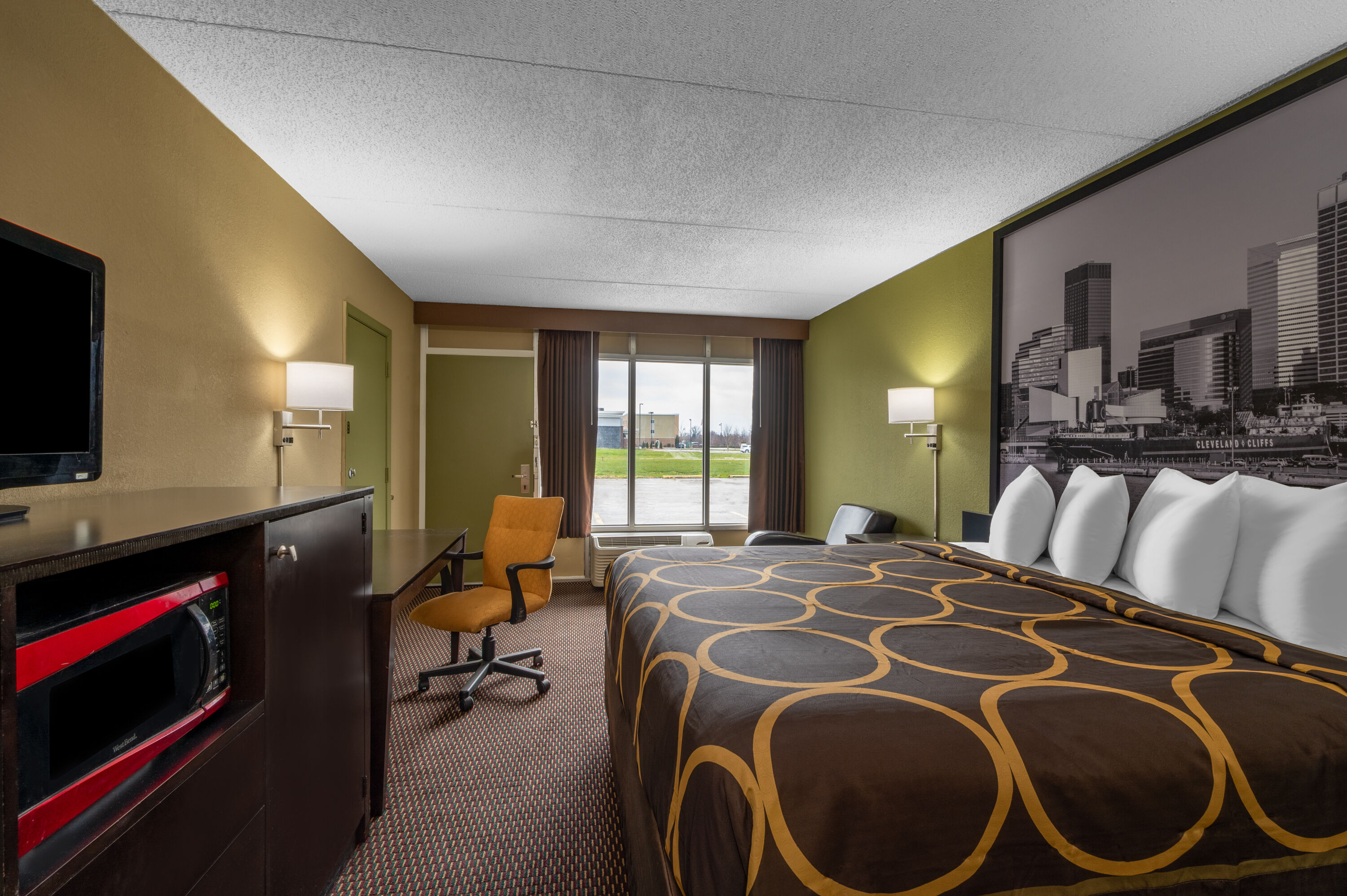 Guest room at the Super 8 by Wyndham Perrysburg/Toledo in Perrysburg, Ohio