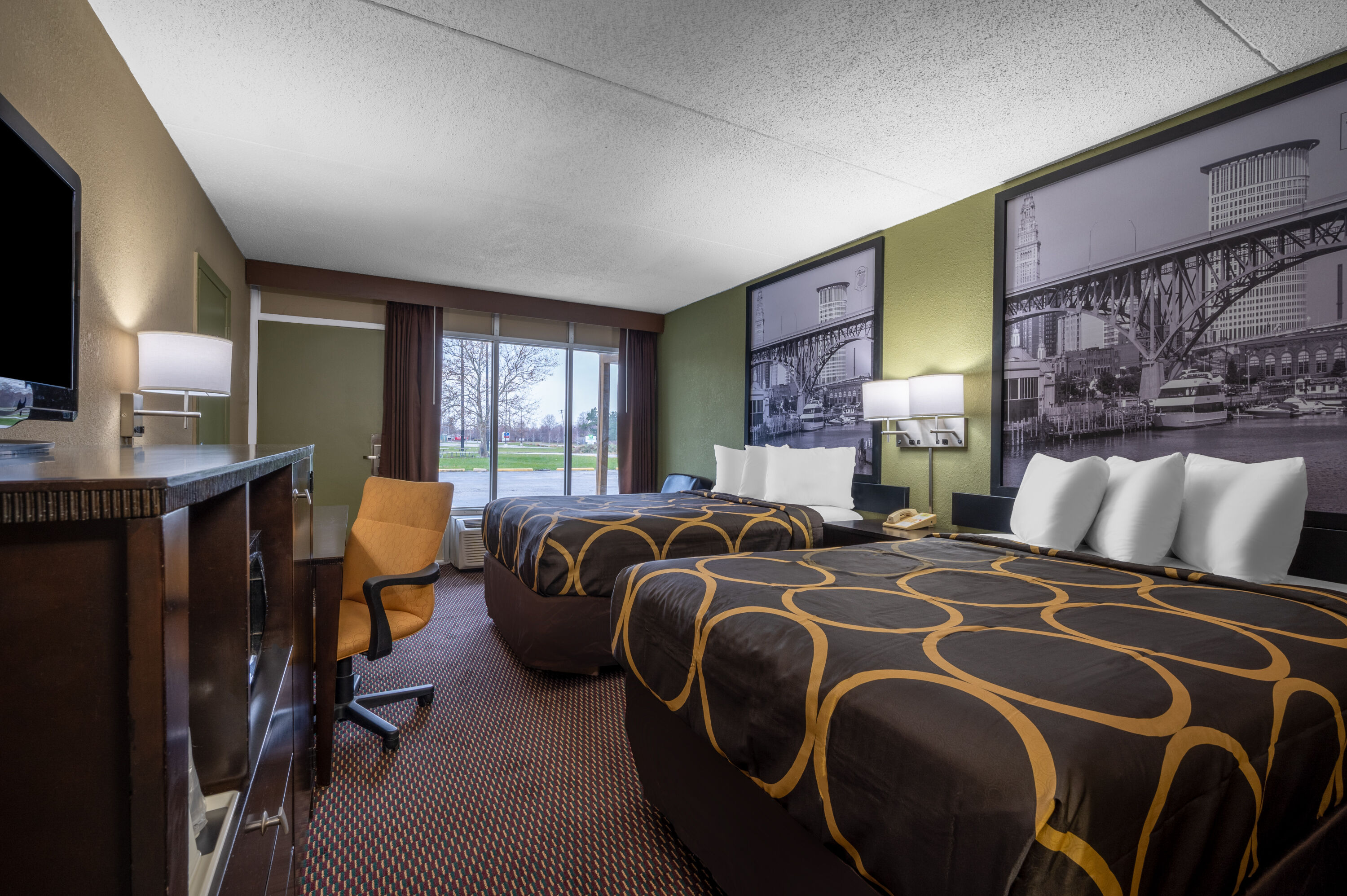 Guest room at the Super 8 by Wyndham Perrysburg/Toledo in Perrysburg, Ohio