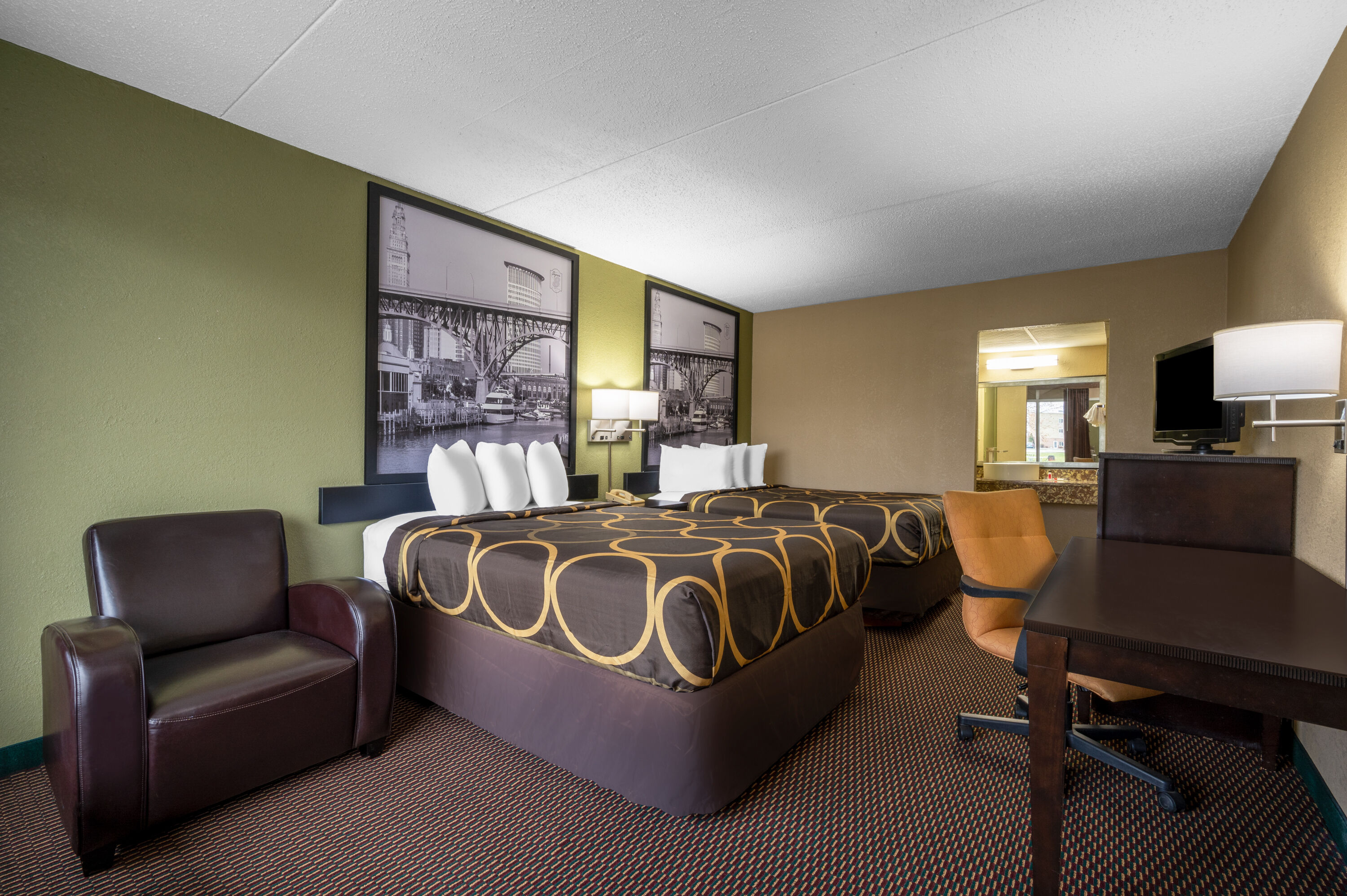 Guest room at the Super 8 by Wyndham Perrysburg/Toledo in Perrysburg, Ohio