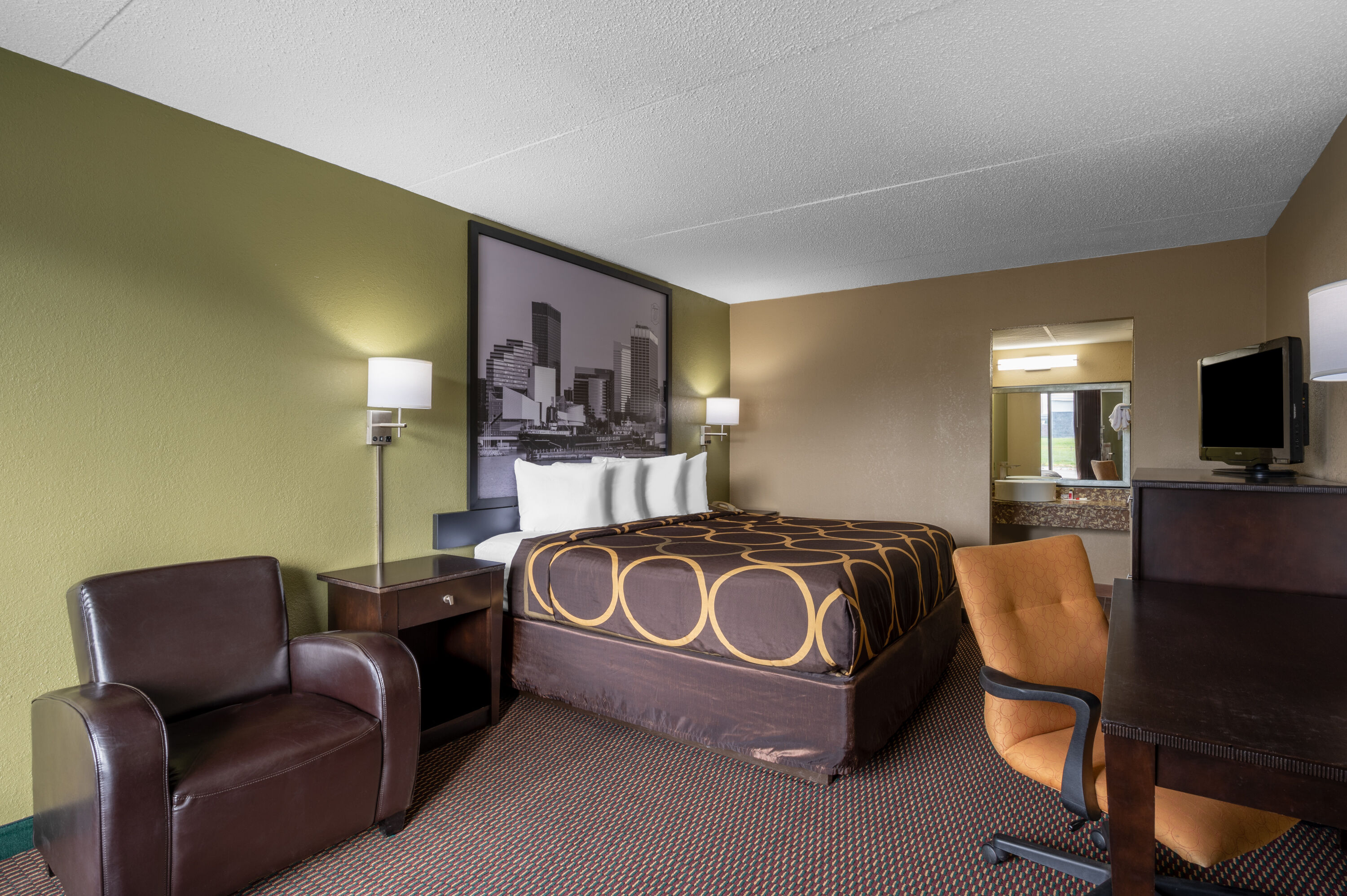 Guest room at the Super 8 by Wyndham Perrysburg/Toledo in Perrysburg, Ohio