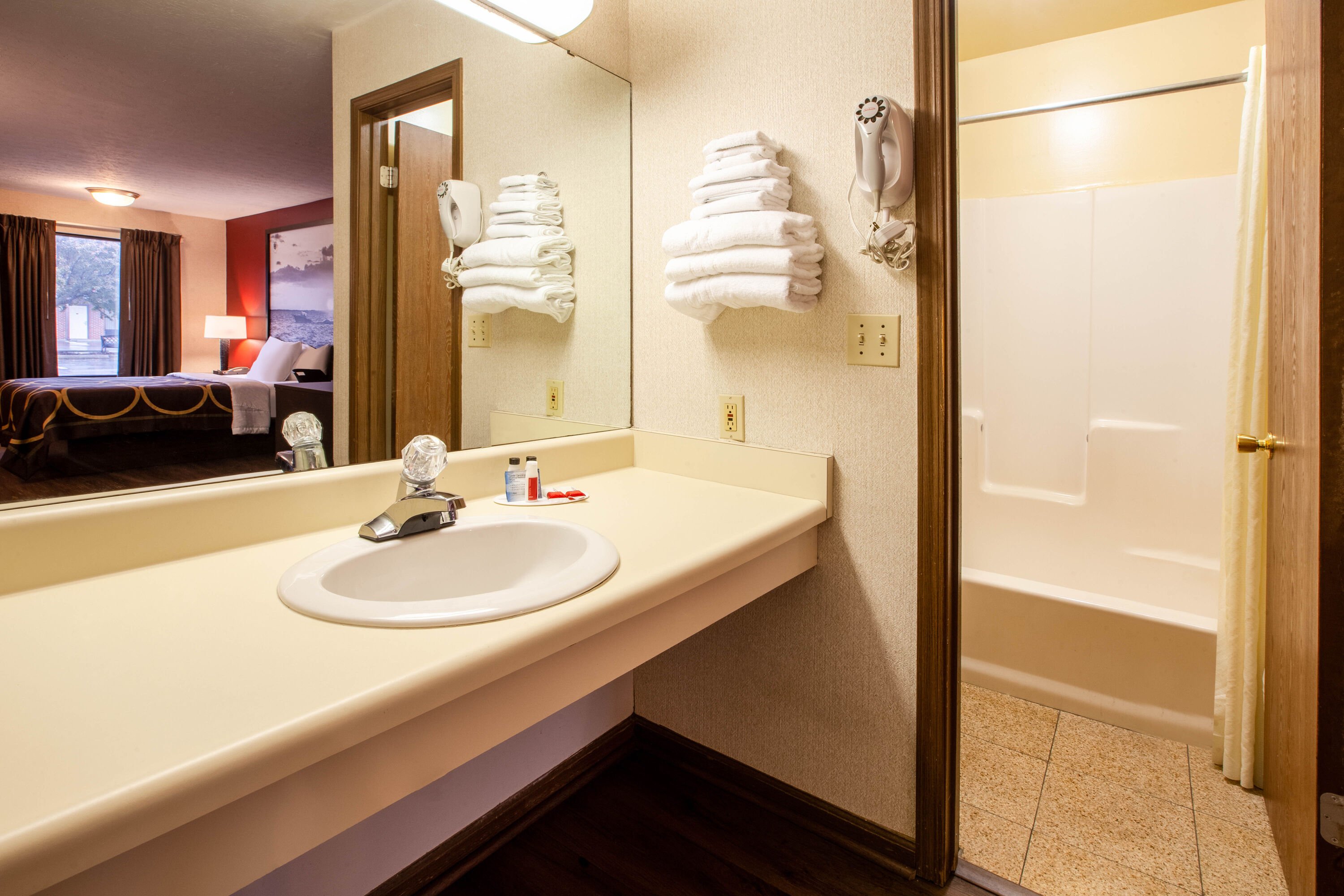 Guest room bath at the Super 8 by Wyndham Sandusky in Sandusky, Ohio