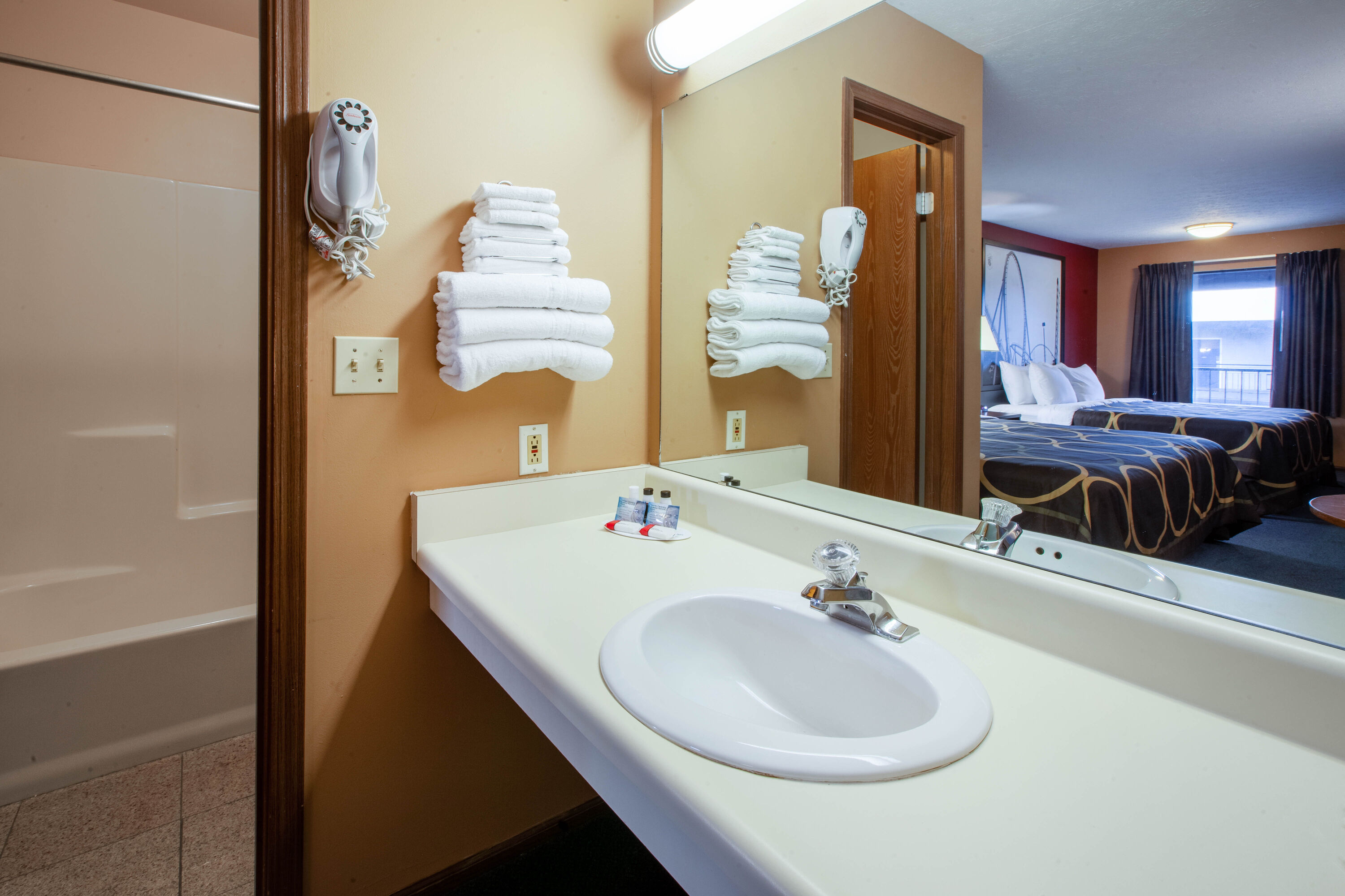 Guest room bath at the Super 8 by Wyndham Sandusky in Sandusky, Ohio