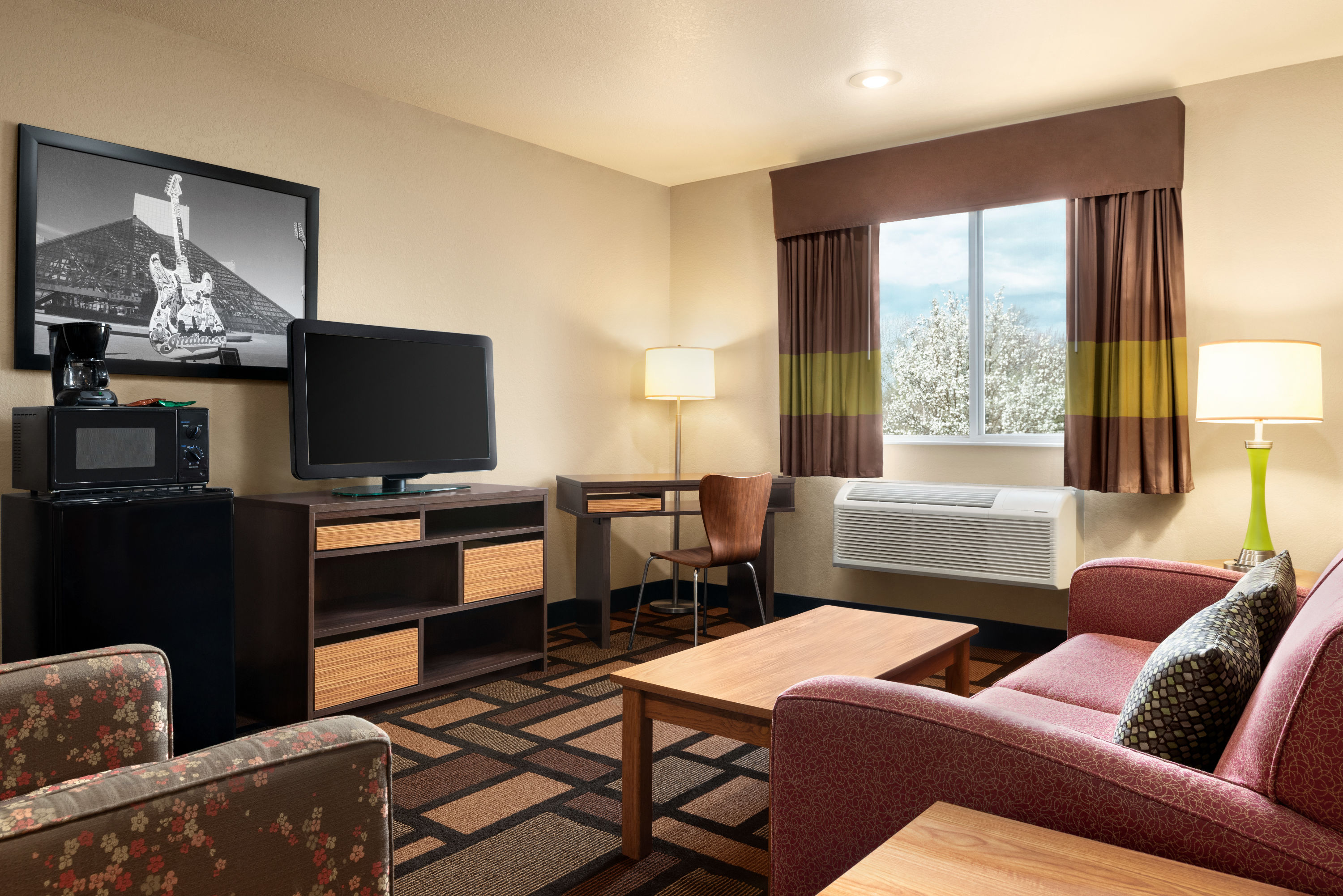 Super 8 by Wyndham Akron S/Green/Uniontown OH suite in Uniontown, Ohio