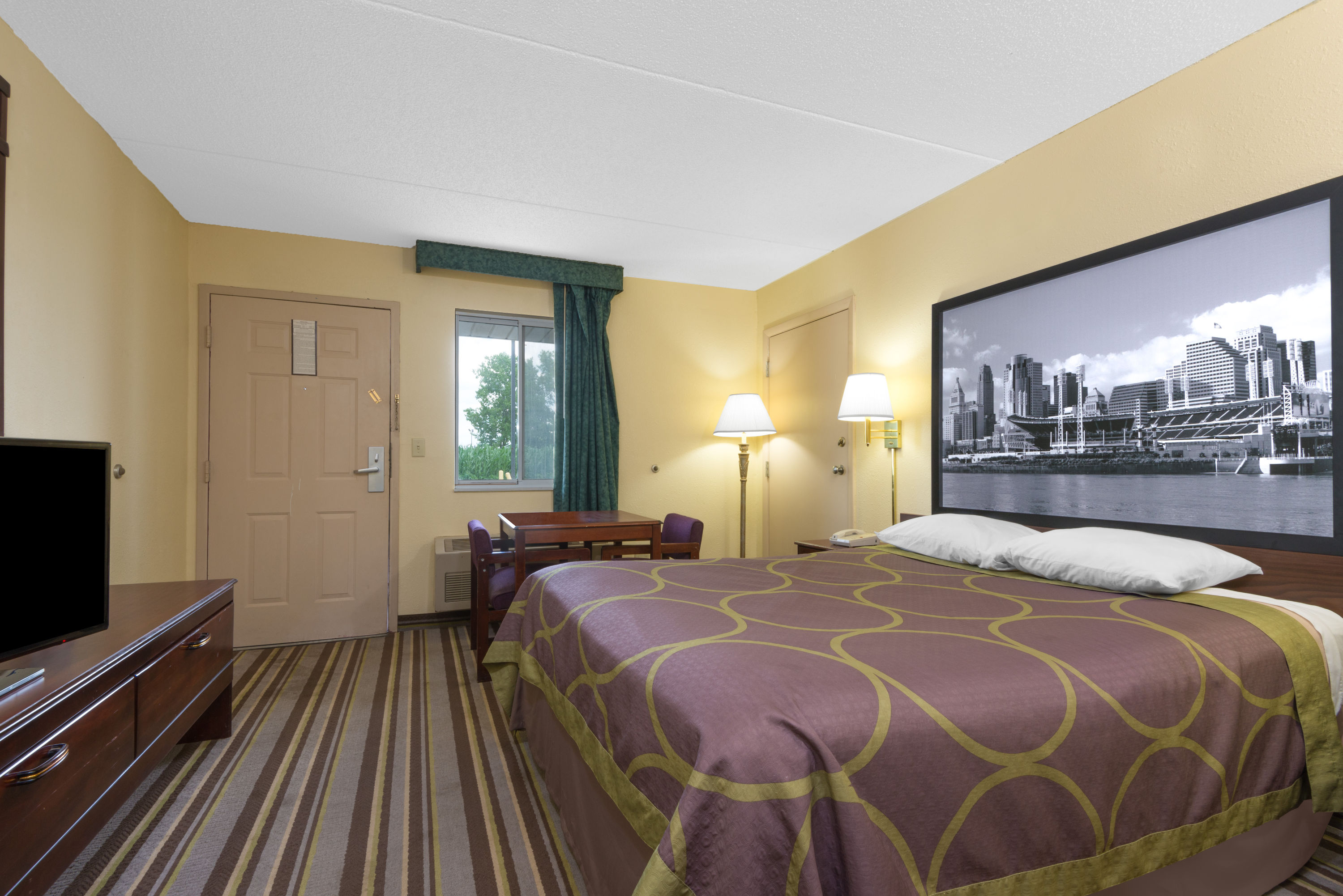 Guest room at the Super 8 by Wyndham Wapakoneta in Wapakoneta, Ohio