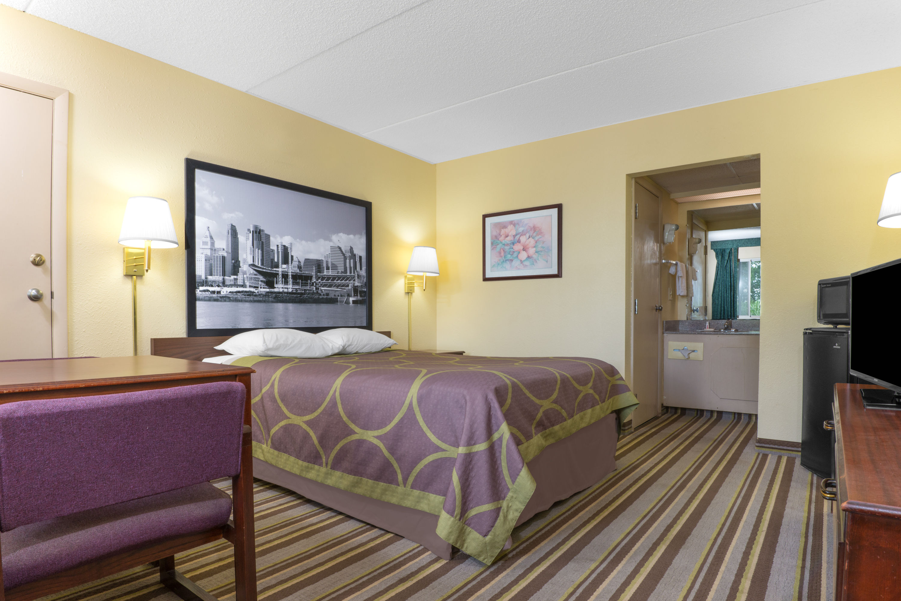 Guest room at the Super 8 by Wyndham Wapakoneta in Wapakoneta, Ohio