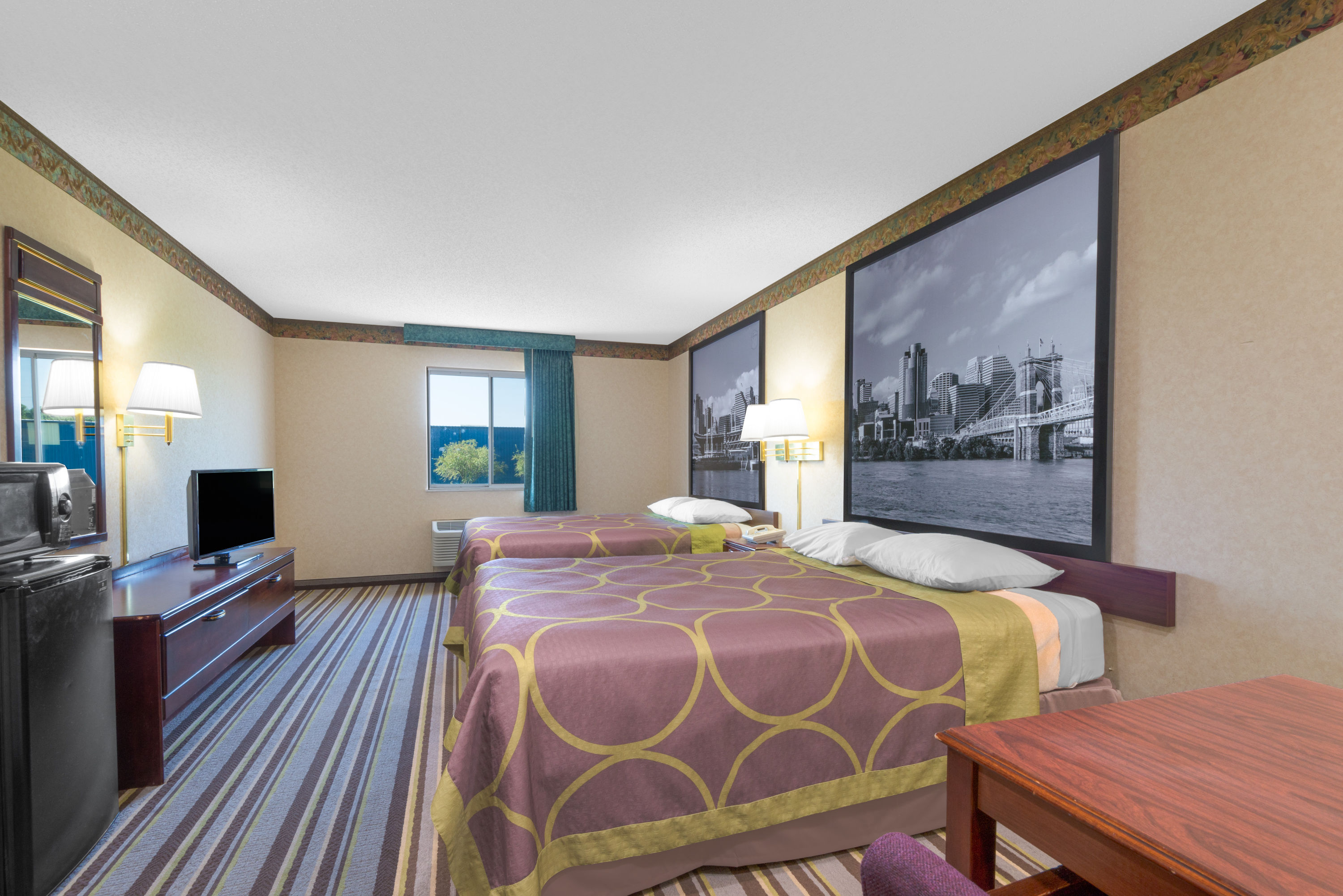 Guest room at the Super 8 by Wyndham Wapakoneta in Wapakoneta, Ohio